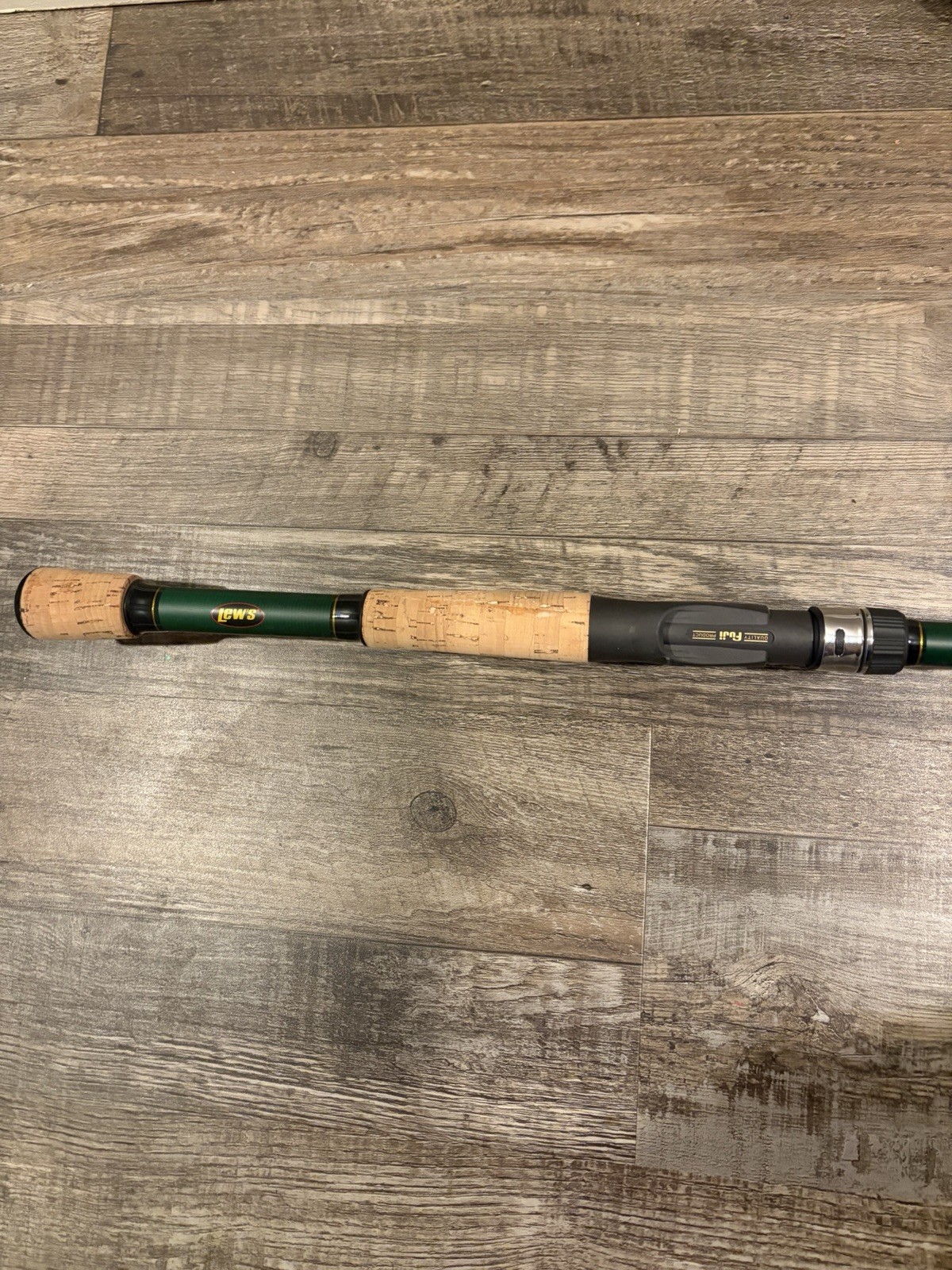 Lews TP1 Black 7 0ft Med Hvy Rod and Lews David Fritts Palmer 7 6 Crankbait Rod.