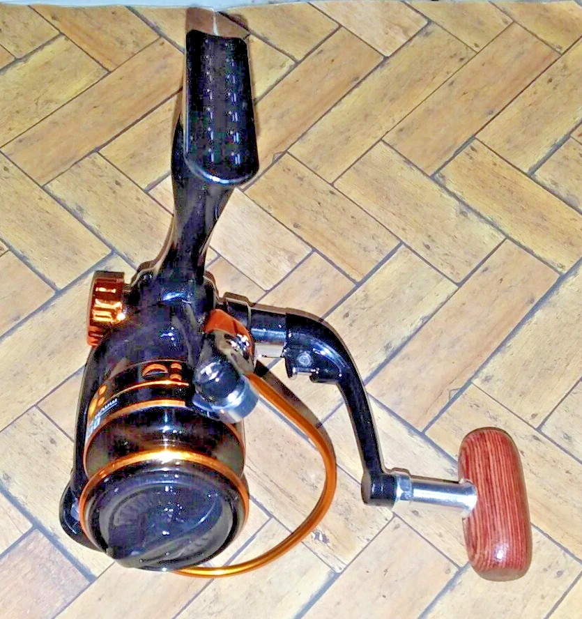 TWO 6 Foot Carbon Fiber Fishing Rods & Two 1000 Spinning Ultra Light REELS!