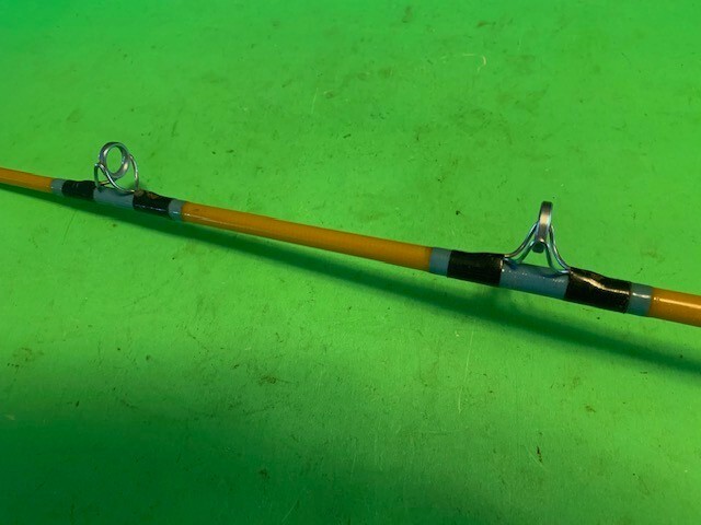 VINTAGE GOLDEN SABRE STROKER 6 FOOT 6 INCH 20 TO 50 POUND RATED FISHING ROD