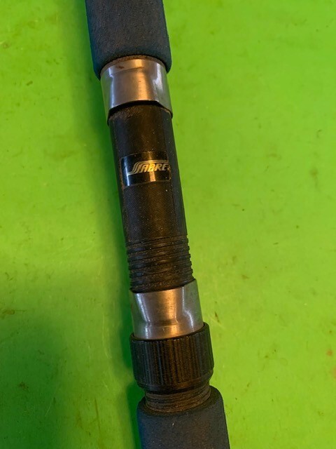 VINTAGE SABRE GOLDEN 6 FOOT 6 INCH 20 TO 50 POUND RATED CONVENTIONAL FISHING ROD