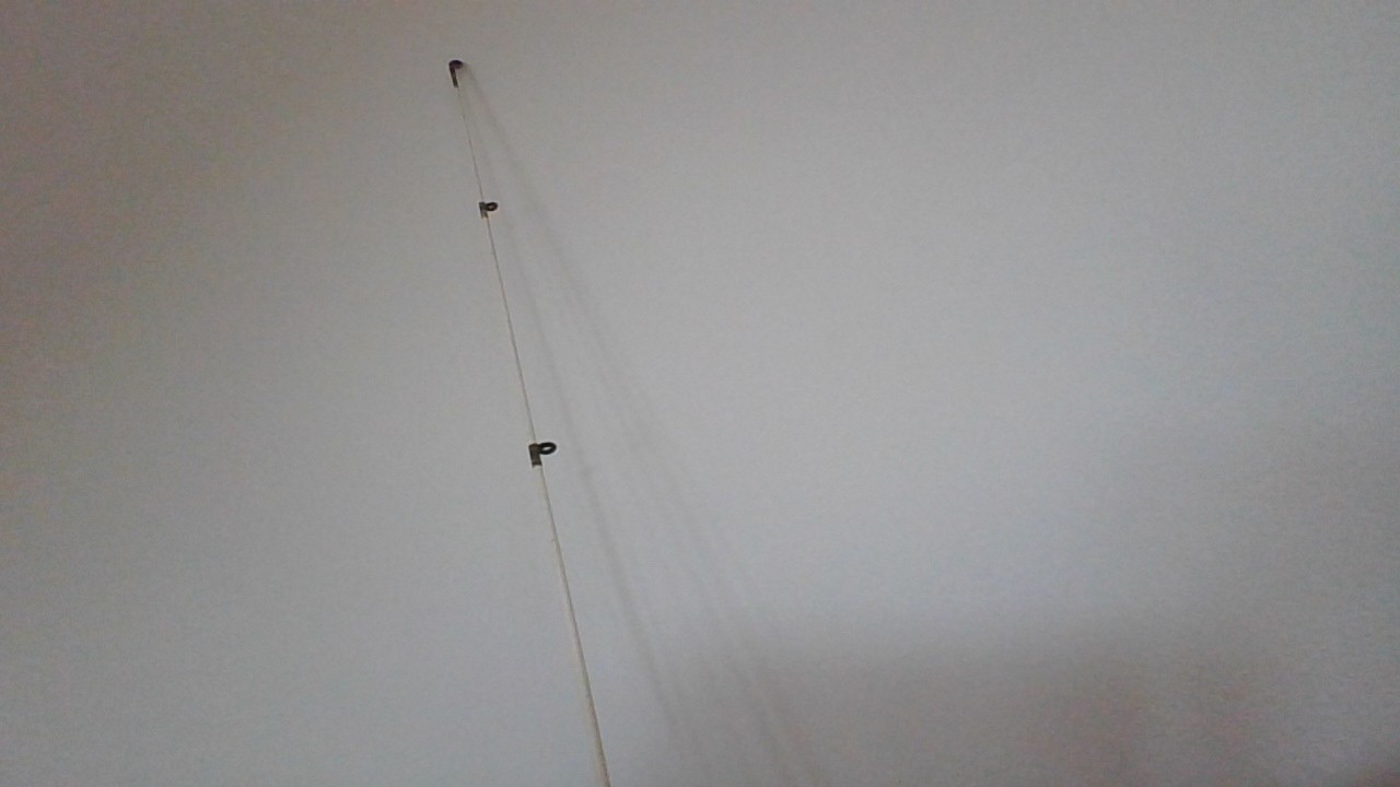 fishing rod white and black. Brand= Shakespearse. Good for redfish and snook.