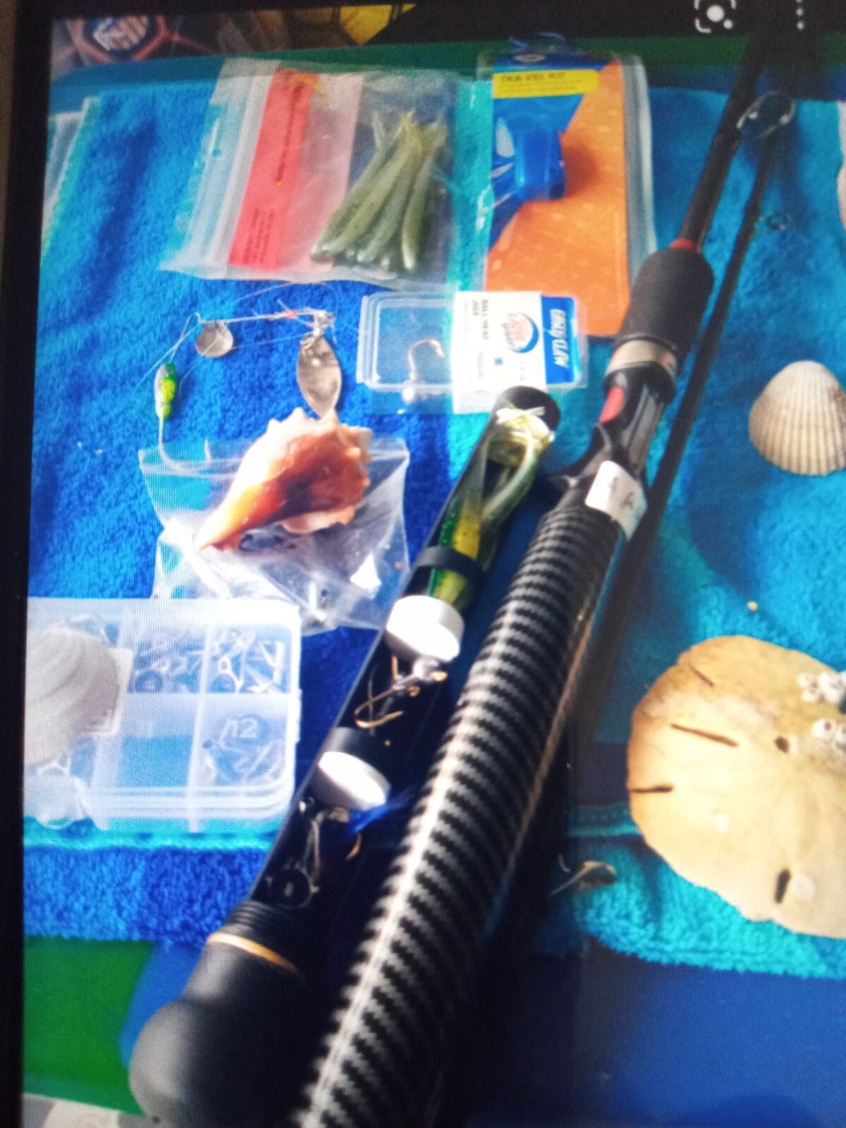 Tackle Rod Pro storage fishing rods. Black & Red / Black on Blk Carbon Fiber rod