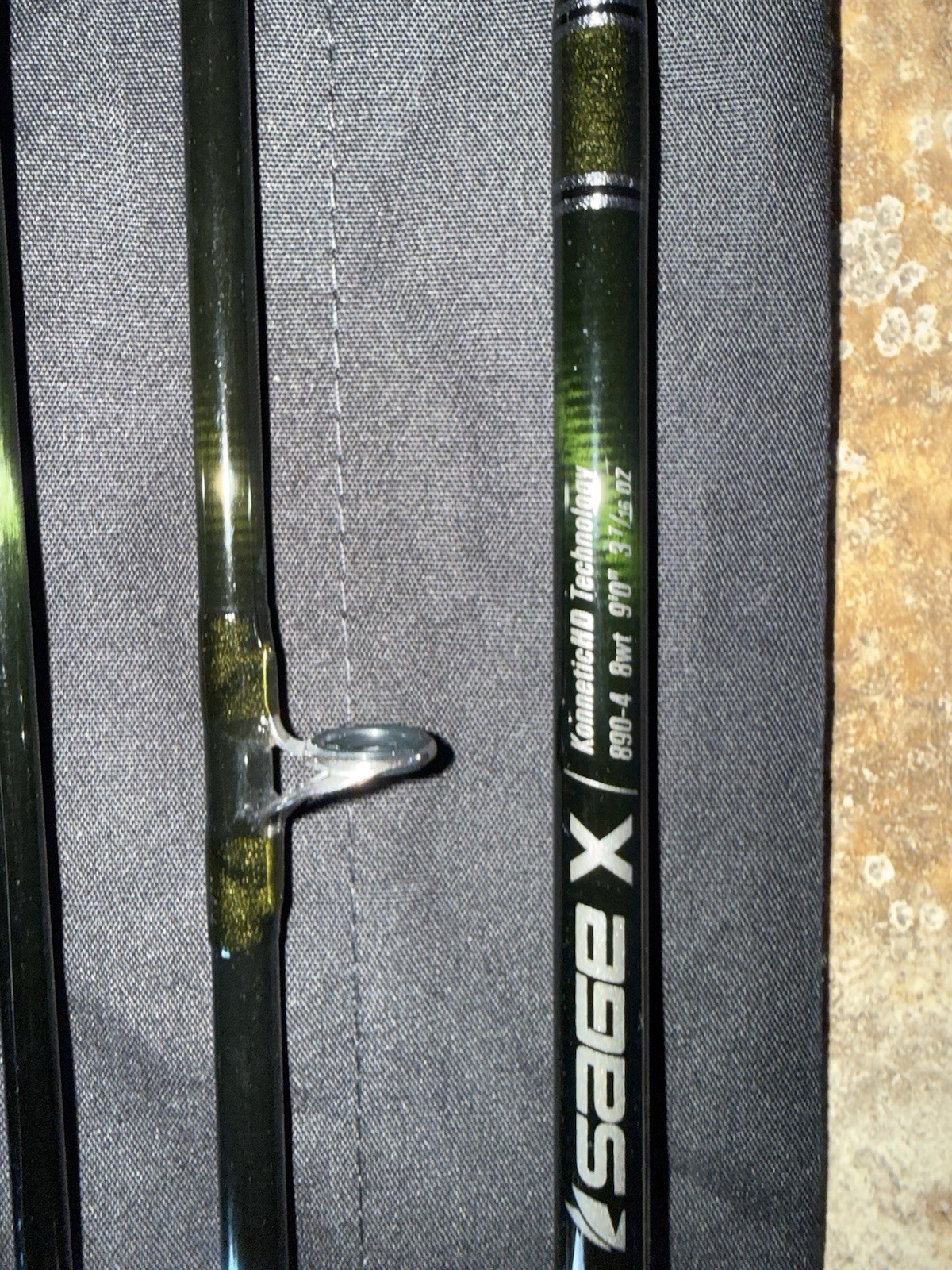 Sage X 890-4 Fly Rod 8 wt 9ft 4pc with a sage salt tube and sock