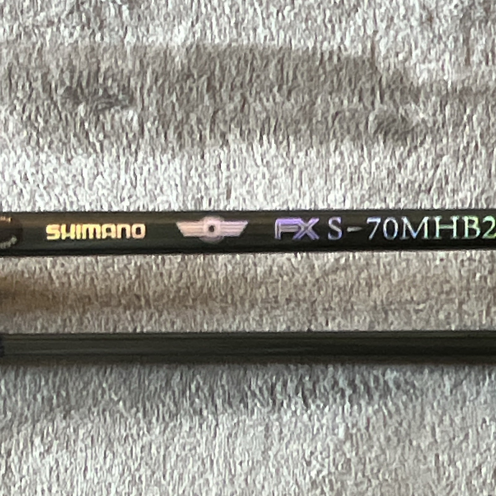 Shimano 2pc FXS70MHB2 7’0 Spinning Rod. X-Tube Shrink Wrap Installed On Handle