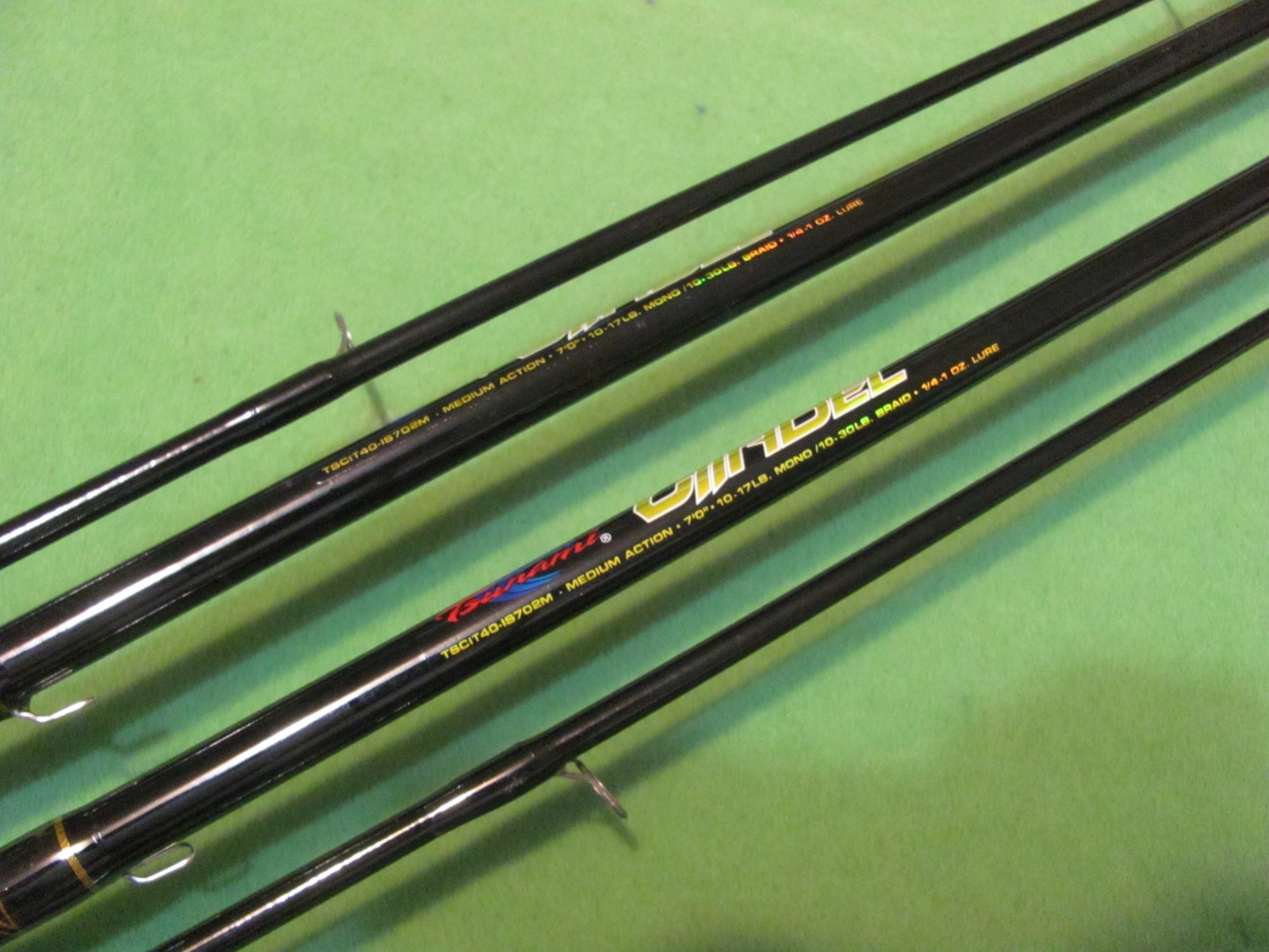 Lot of 2 Tsunami Citadel 7′ 0″ Medium Action 2-Piece Spinning Rods.