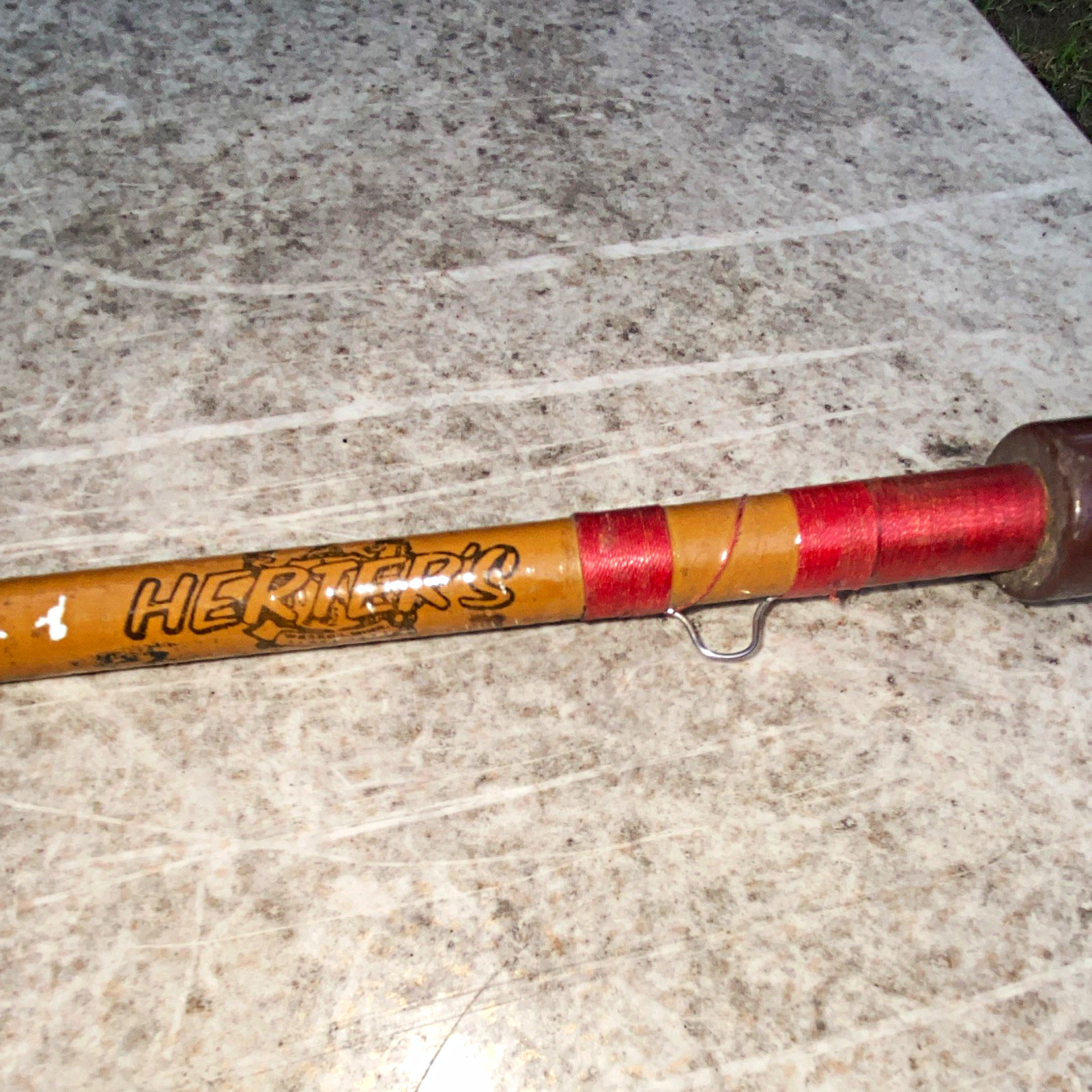 Herters103-He 6’7” Spinning Rod Fiberglass 2pc Cork Handle Brown/Red