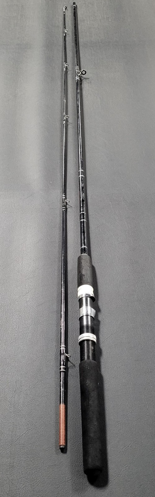 Abu Garcia Popular Action RRGF86, 8’6″ Medium Graphite Spinning Rod 2-Pc, VG+
