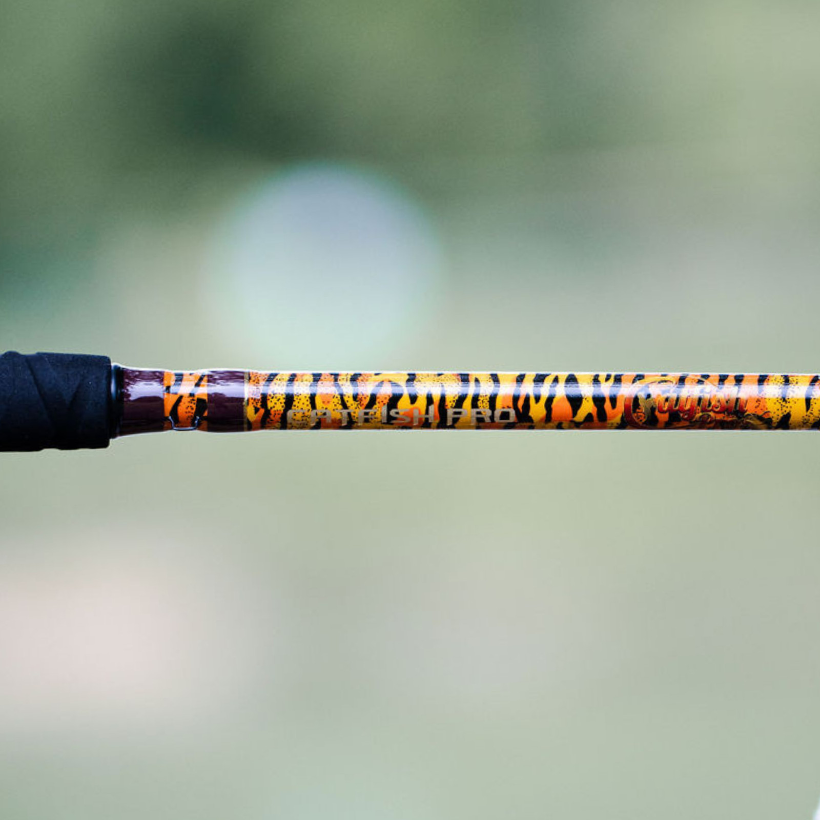 Catfish Pro Limited Edition The Tiger 7’6″ Glow-in-Dark Spinning Rod