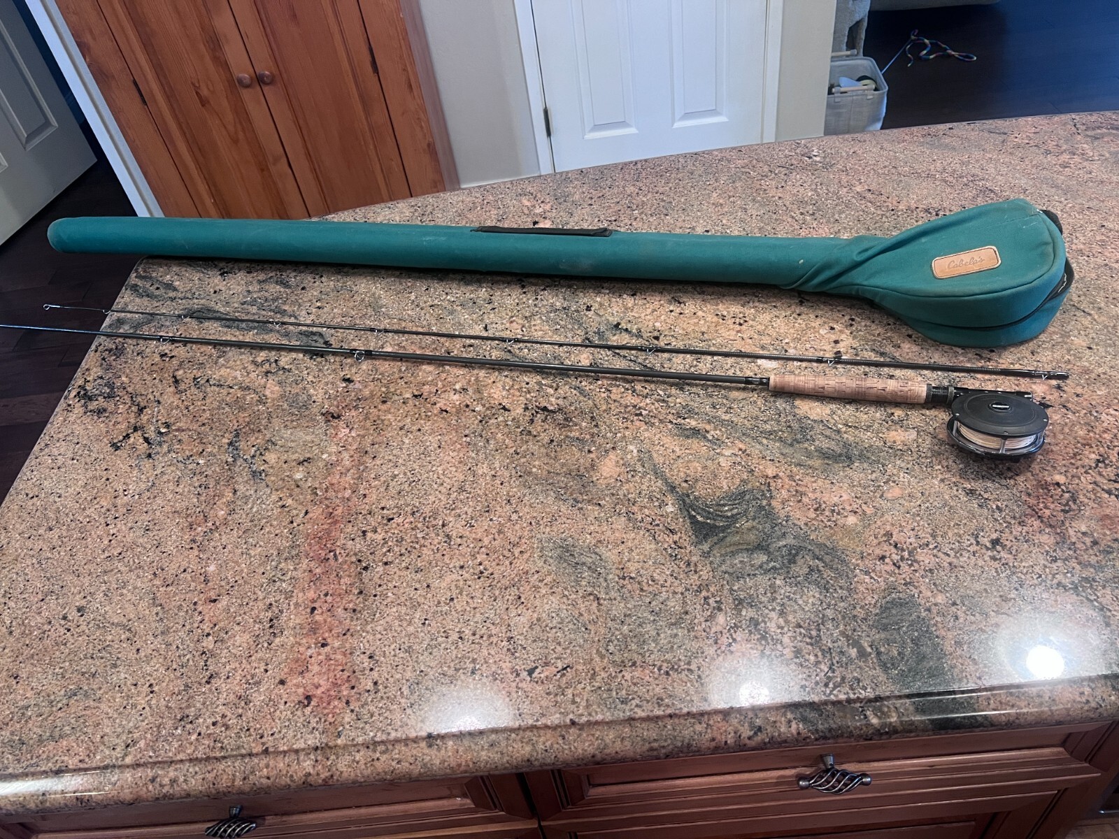 Sage Graphite #6-7 Line 9′ Fly Rod. Sage Model 106 Reel & Cabela 2 Rod Case
