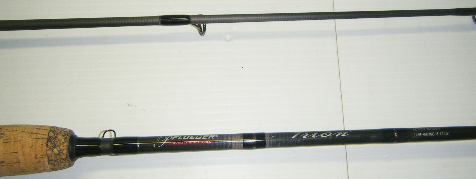 Pflueger Trion 66” Two-piece Med. Action Spinning Rod