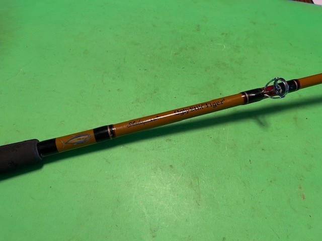 SHAKESPEARE UGLY STIK TIGER 7 FOOT 20 TO 50 POUND RATED CONVENTIONAL FISHING ROD