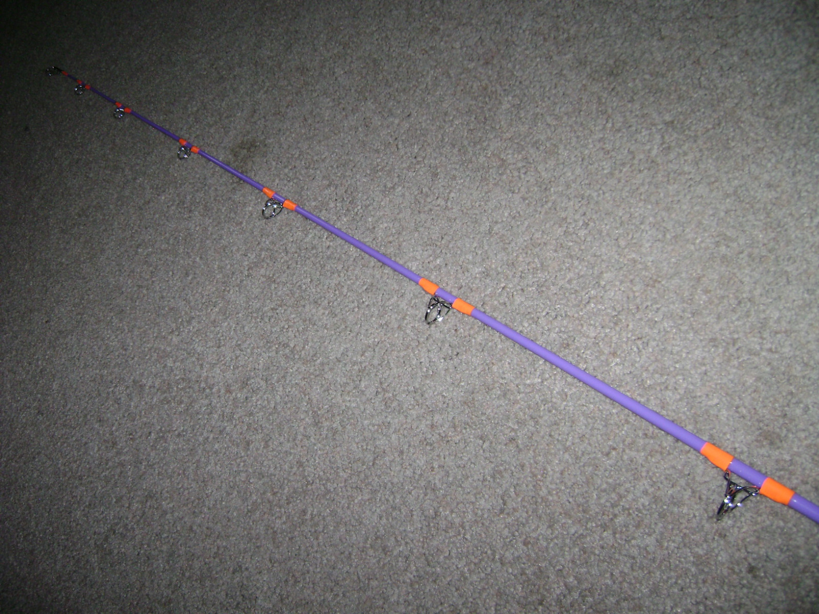 GLOW ROD MEAT HUNTER FLEX 6′ SPINNING -BIG FISH- GLOWS PURPLE UNDER BLACK LIGHT!
