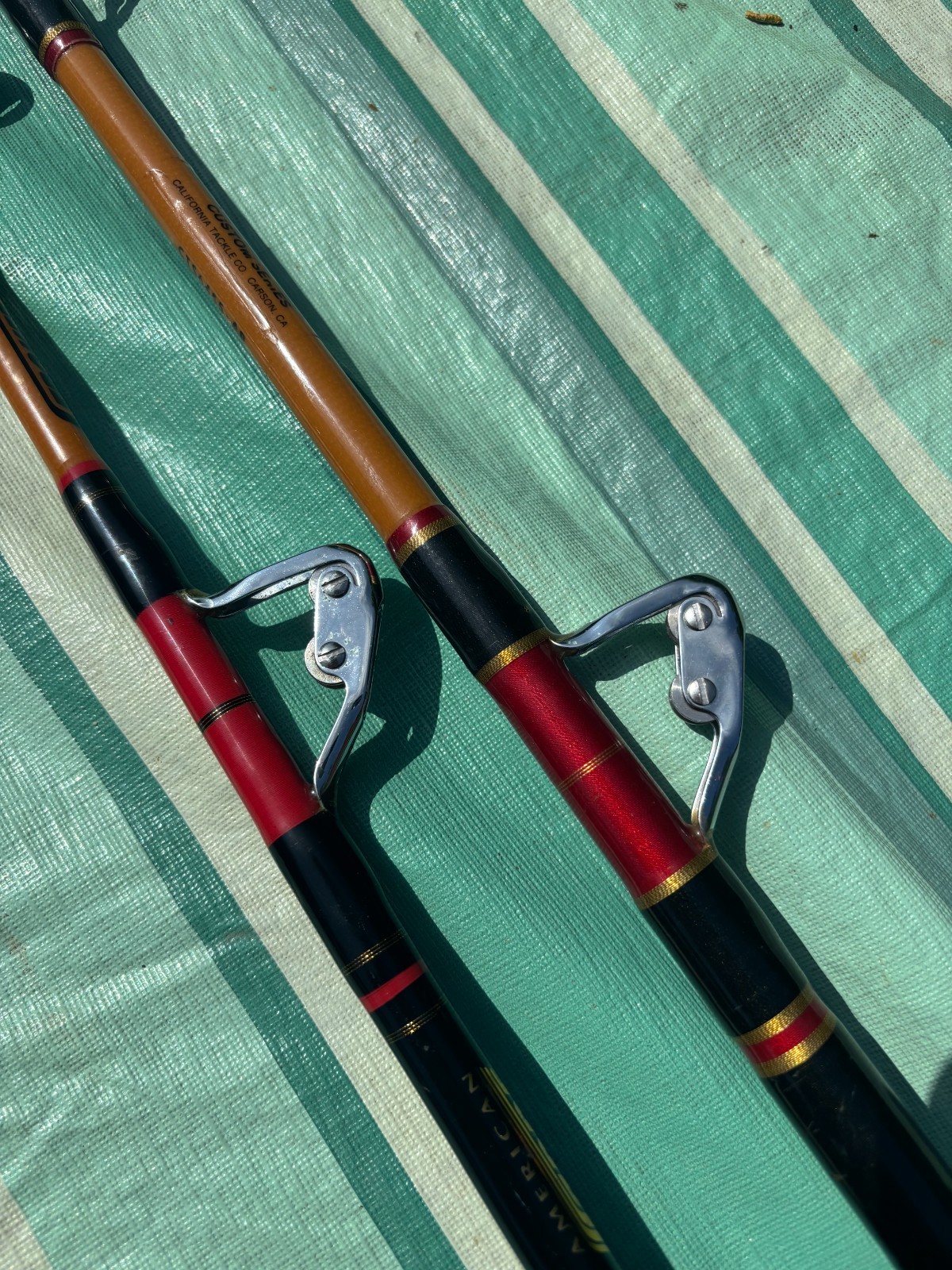LOT of 2 VINTAGE HEAVY SABRE STROKER ROLLER TROLLING FISHING RODS VERY NICE!!