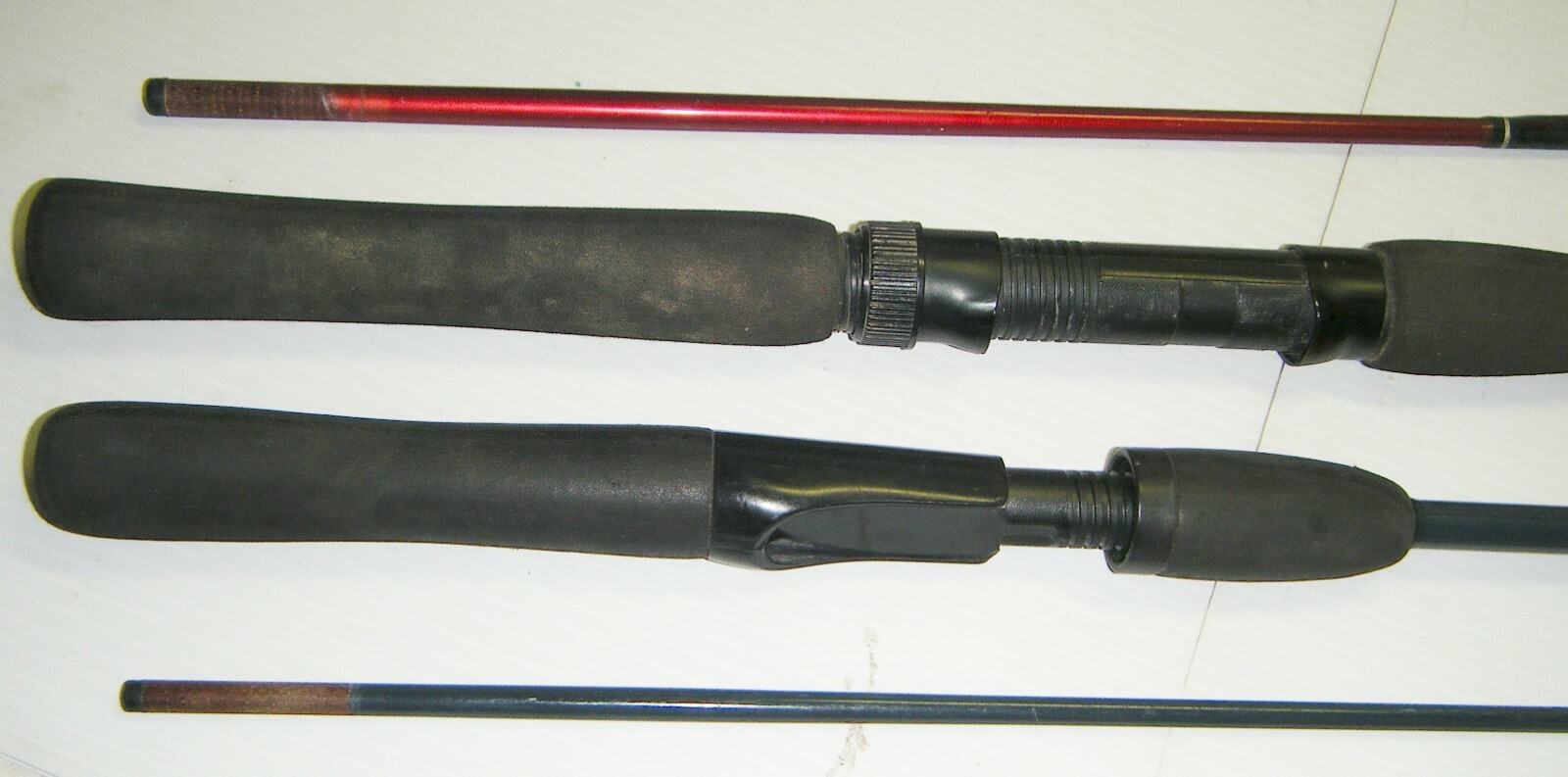 2 Shakespeare 2-Piece Spinning Rods- 1 Firebird 6’6” Med. – 1 Pro-Am 5’6” Light