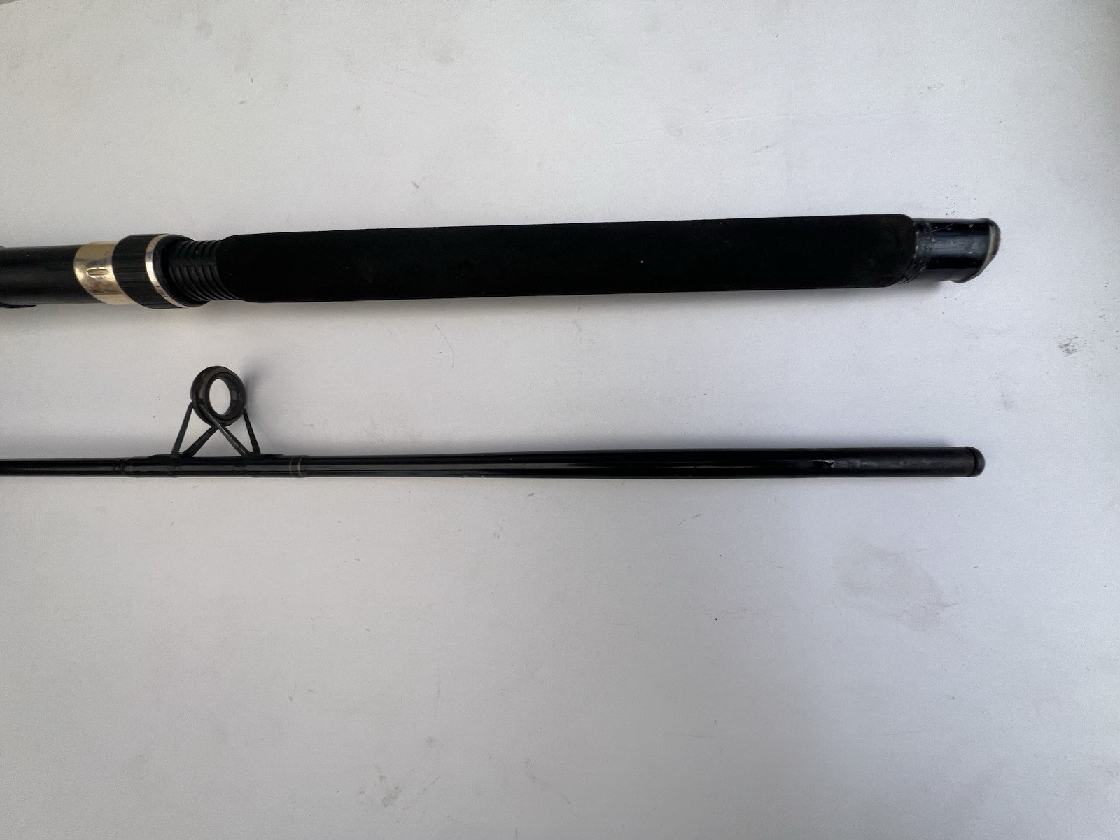 South Bend Black Beauty 2 Piece 10-20lb Spinning Rod Fishing pole 3556 Vintage 7