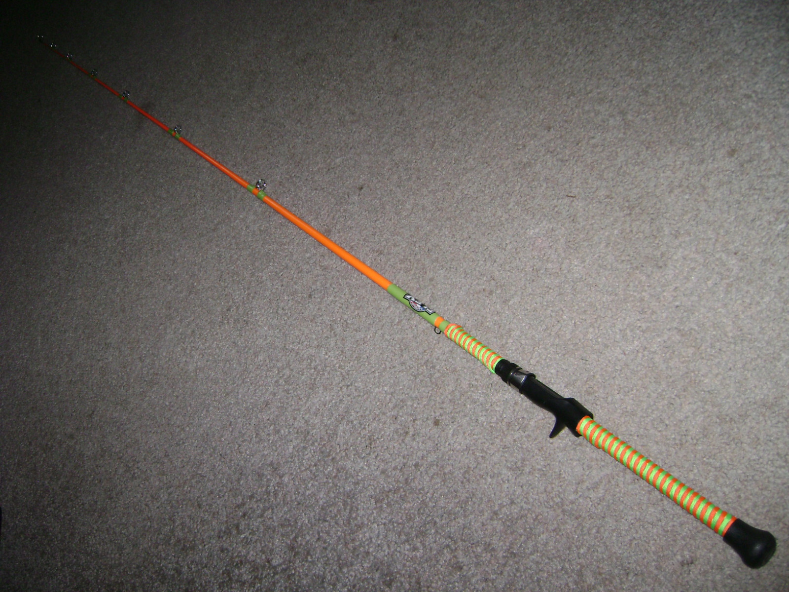 GLOW ROD MEAT HUNTER FLEX 6′ CAST -MADE IN USA -GLOWS ORANGE UNDER BLACK LIGHT !