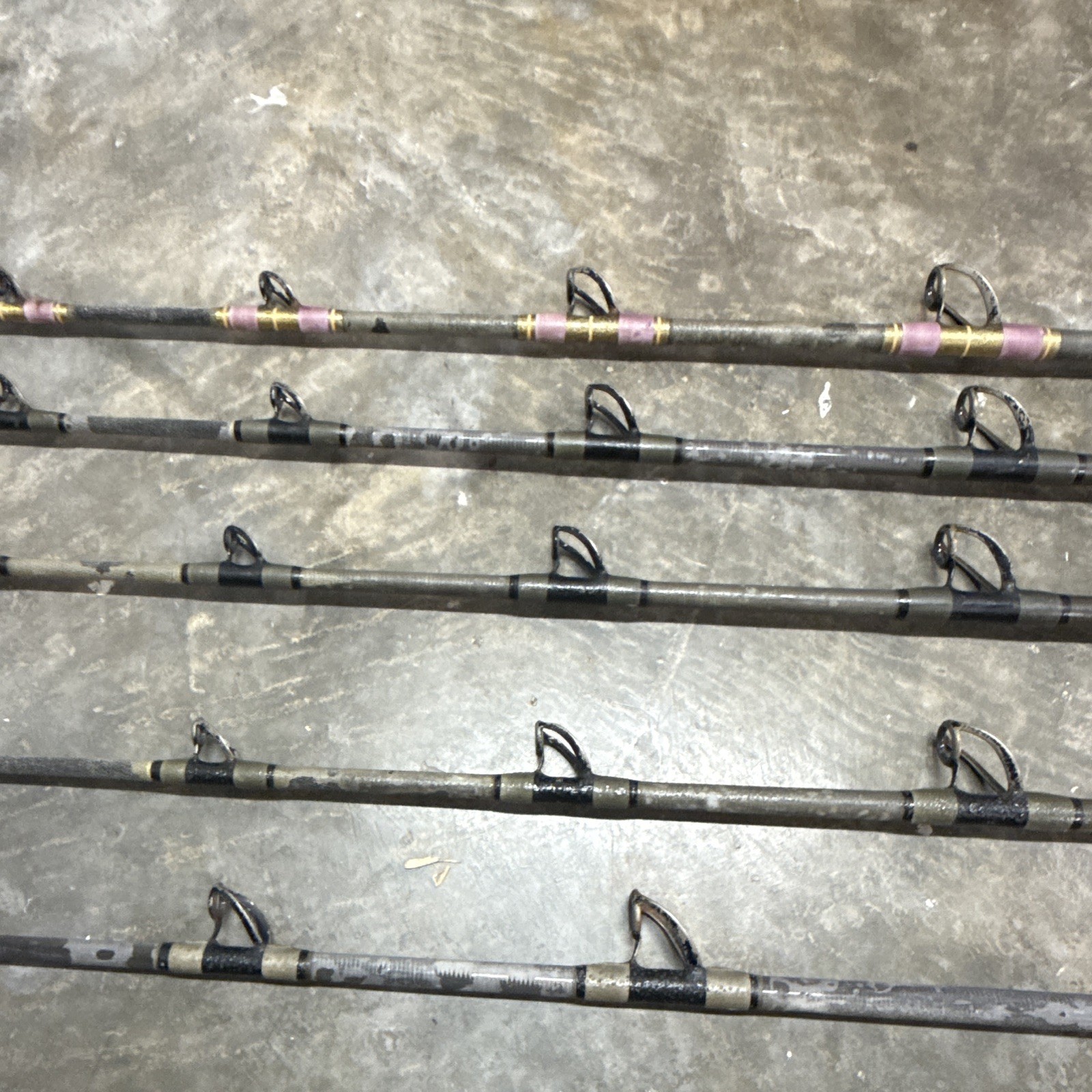 5- Custom tuna rods- used- Calstar blanks- Winthrop tips except 1 of them.