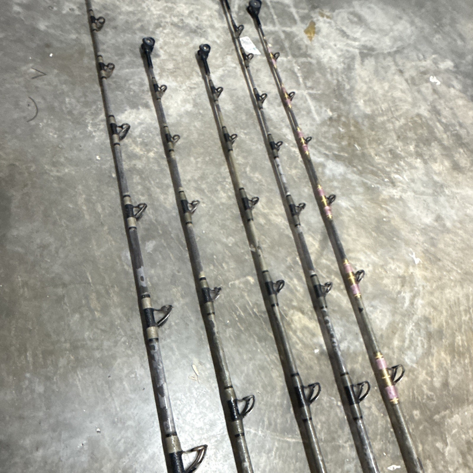 5- Custom tuna rods- used- Calstar blanks- Winthrop tips except 1 of them.