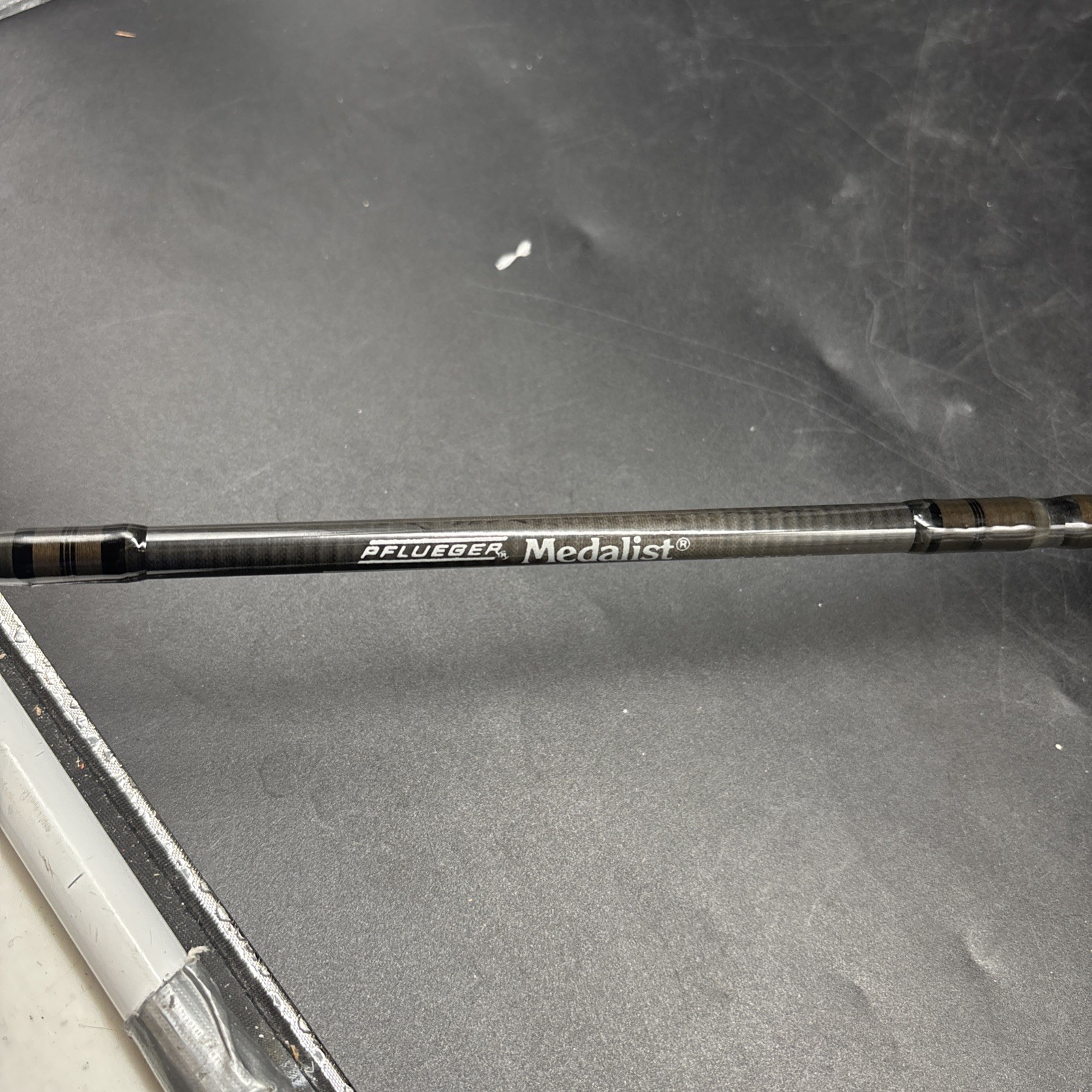 3 pc FISHING ROD LOT-PFLUEGER MEDALIST/Shimano SN-60M/Abu Garcia 400
