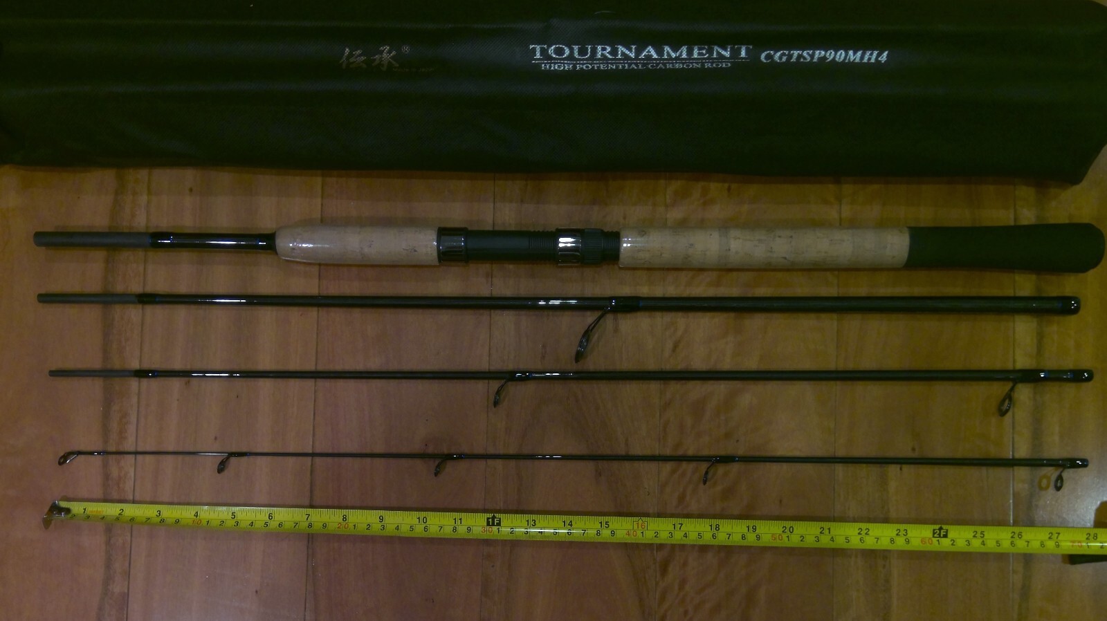 Brand new carbon Tournament spinning fishing rod, 9 ft, 4 pieces, made in Japan