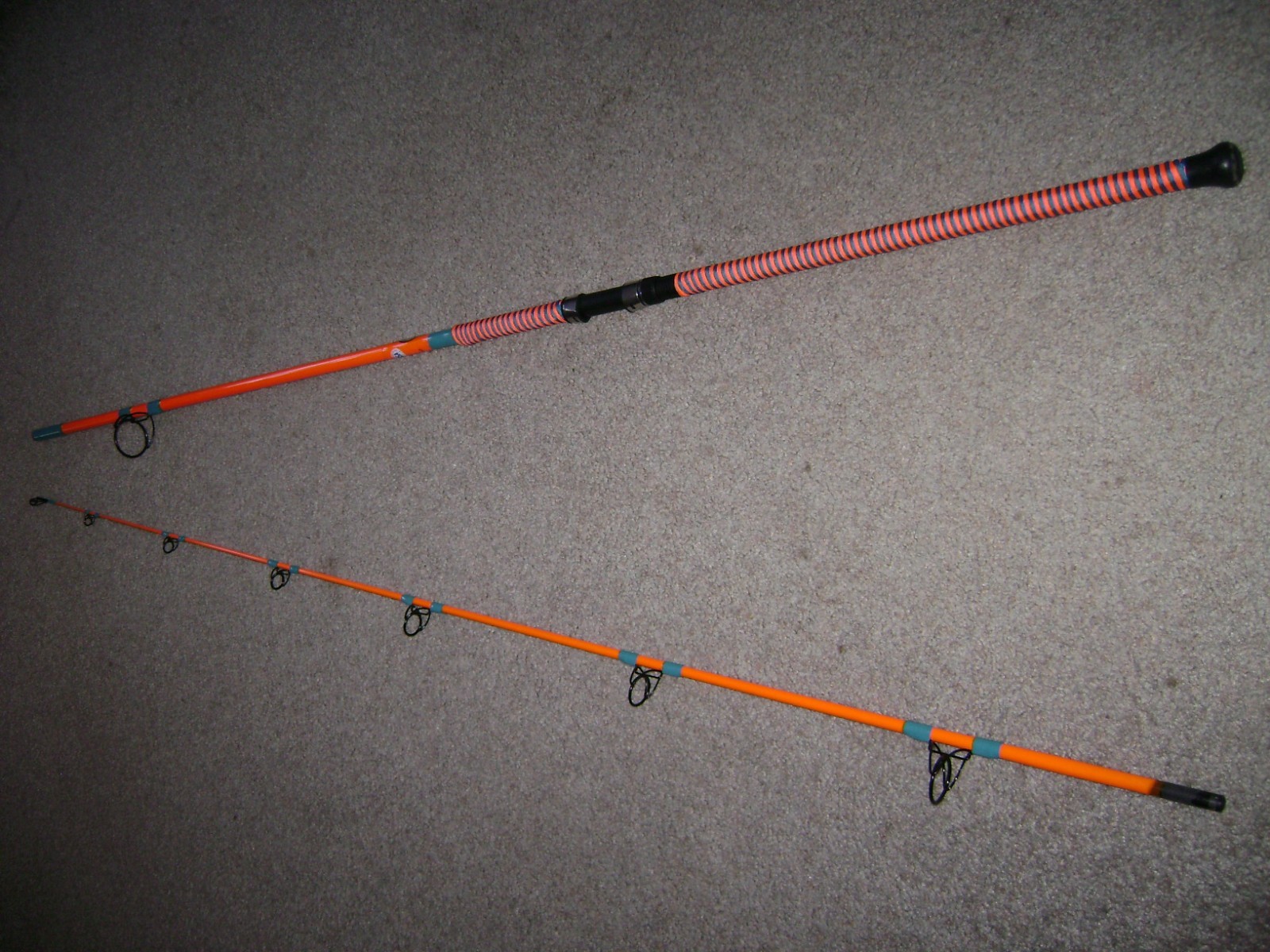 GLOW ROD MEAT HUNTER FLEX 10′ HVY SPINNING -GLOWS ORANGE UNDER BLACKLIGHT !