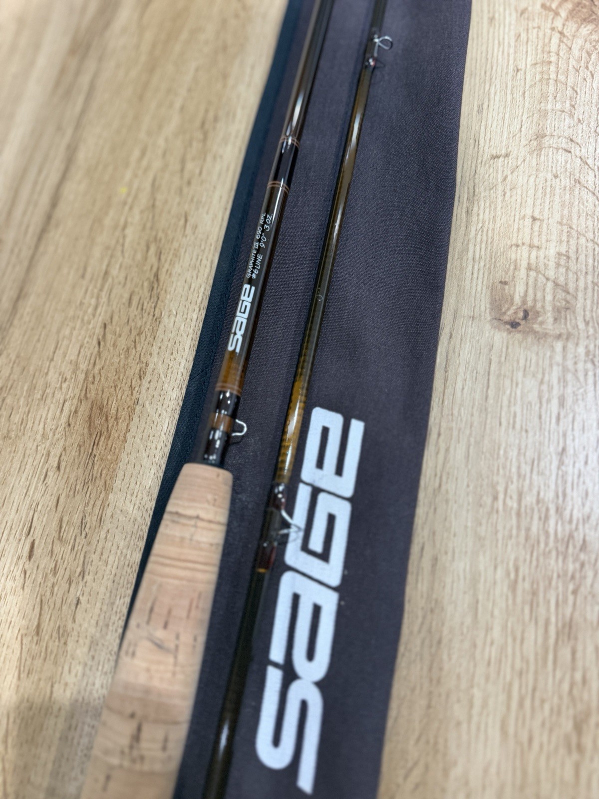 features a Sage Graphite III 690 RPL fly fishing rod NO TUBE