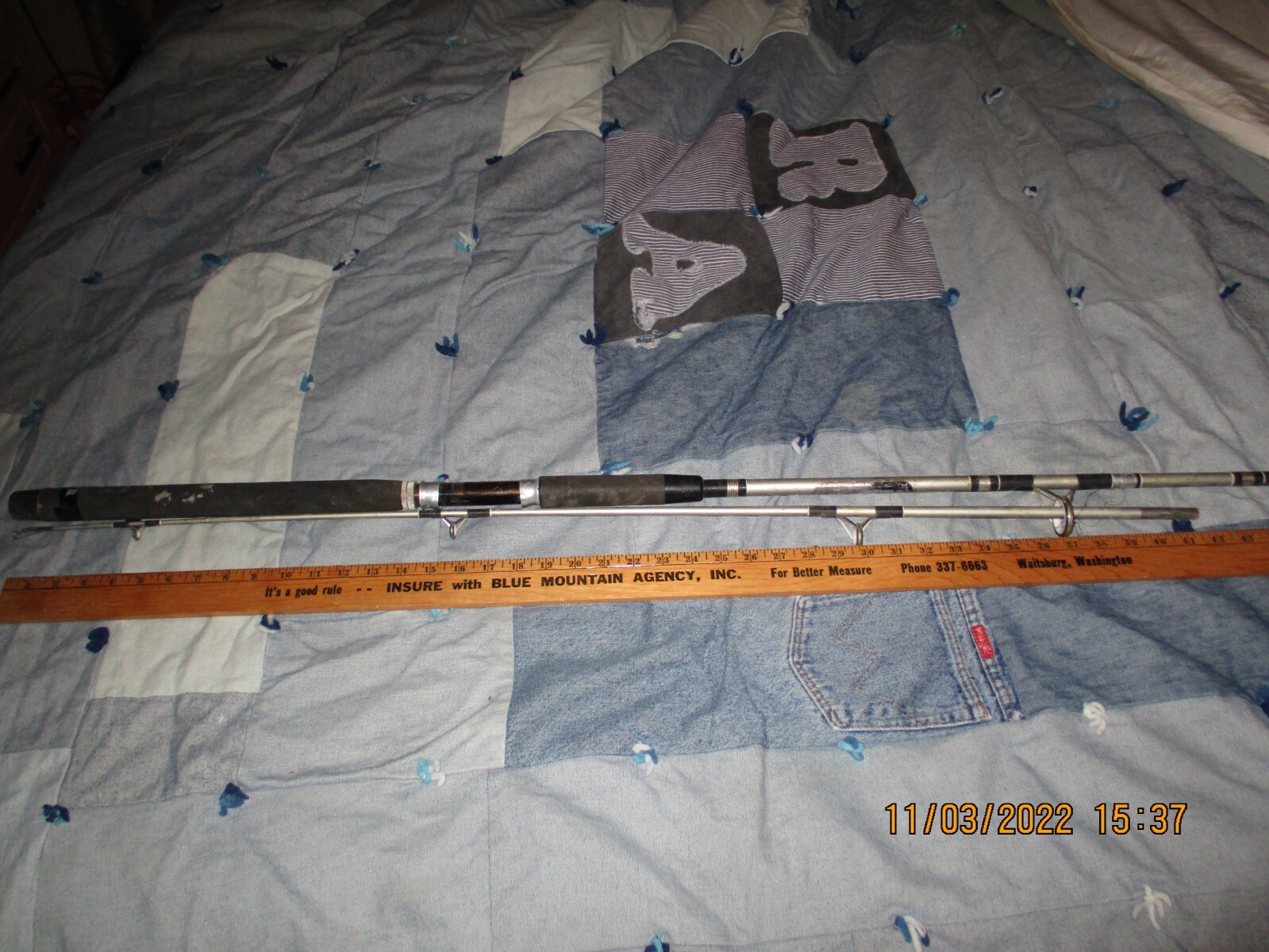 S.W. SPINNING ROD , 7 FOOT LENGTH – WELL USED , BUT STILL USEABLE!