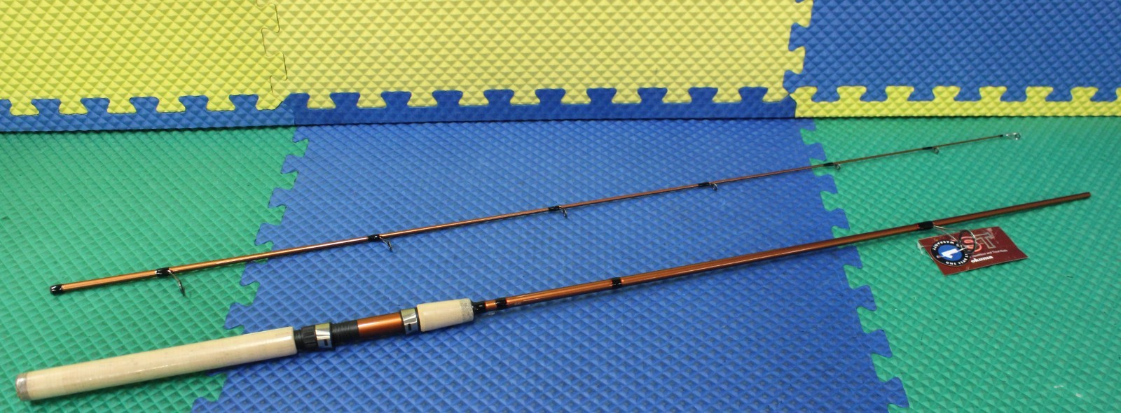 Okuma SST Cork Grip Spinning Rod 7′ 0″ 2 Piece Medium SST-S-702M