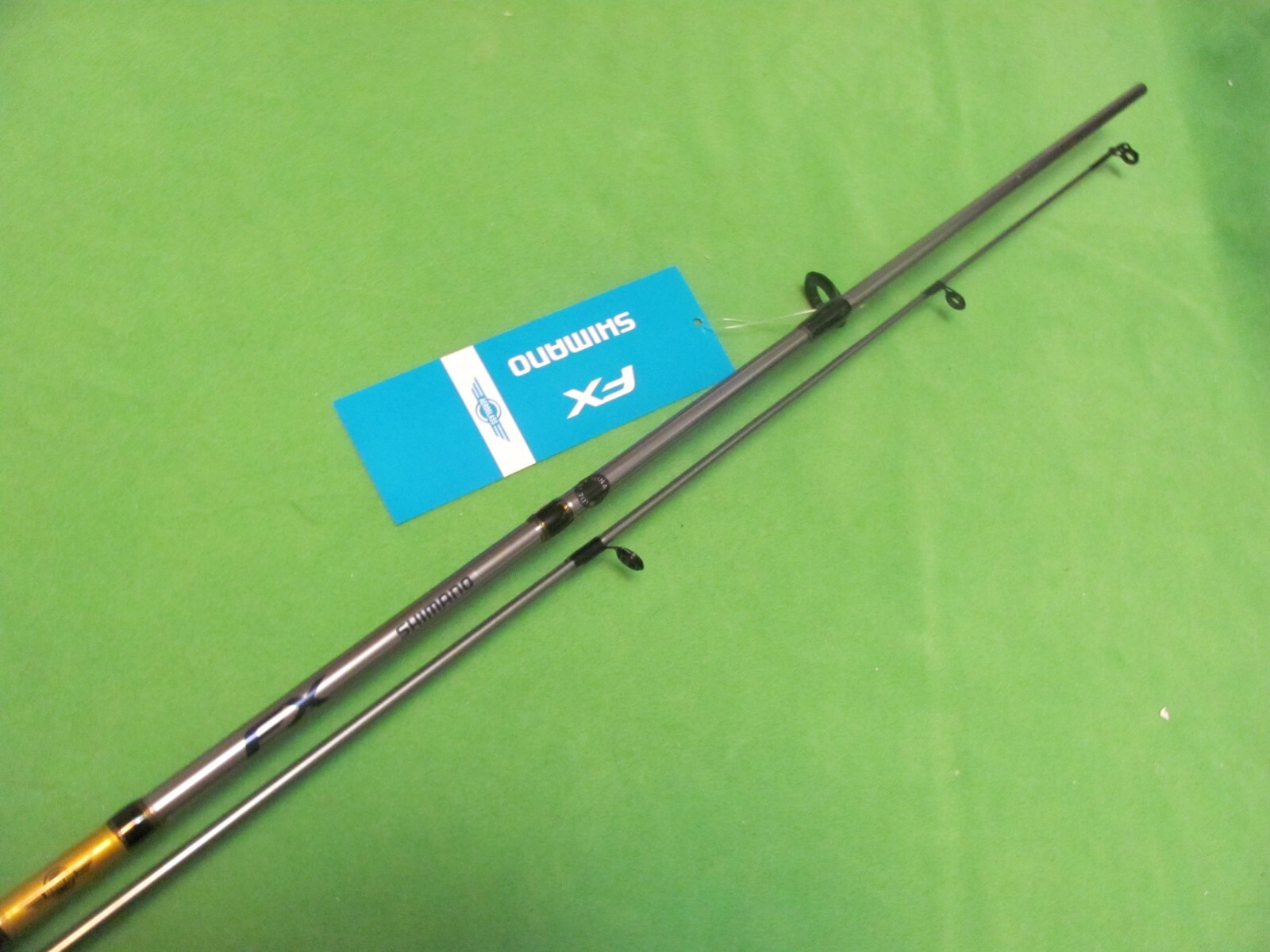 1) SHIMANO FX 5′ 6″ MEDIUM FAST ACTION SPINNING 2 PIECE ROD NEW.