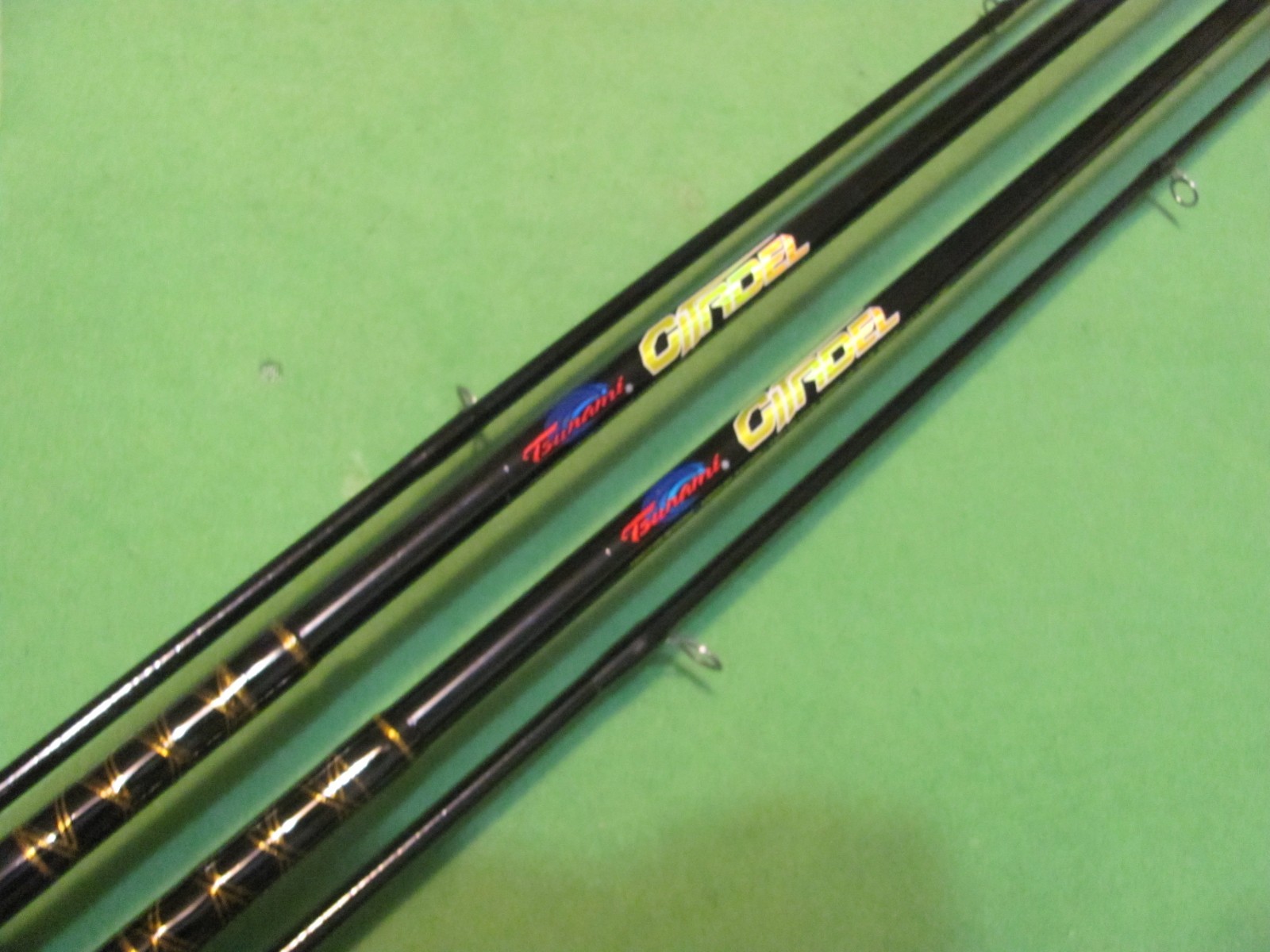 Lot of 2 Tsunami Citadel 7′ 0″ Medium Action 2-Piece Spinning Rods.