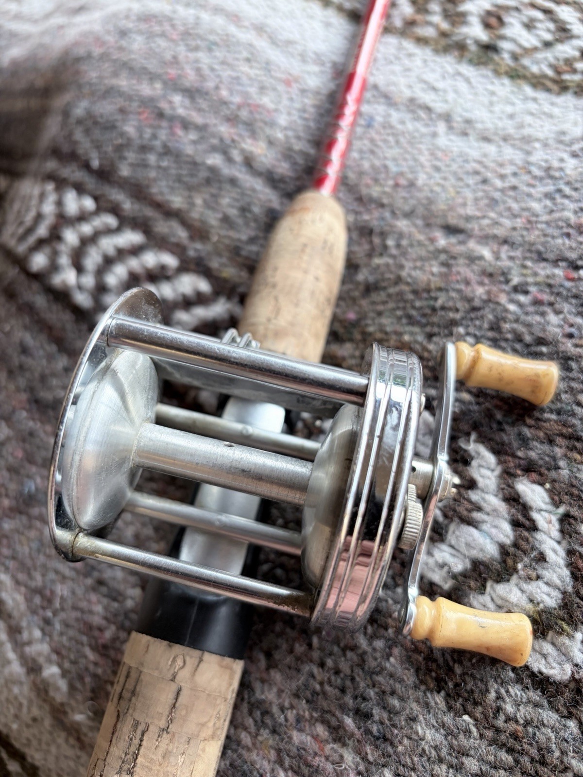 Trump Reel And kwik Stix Fishing Rod. Great Condition Ready To Cast Red Rod