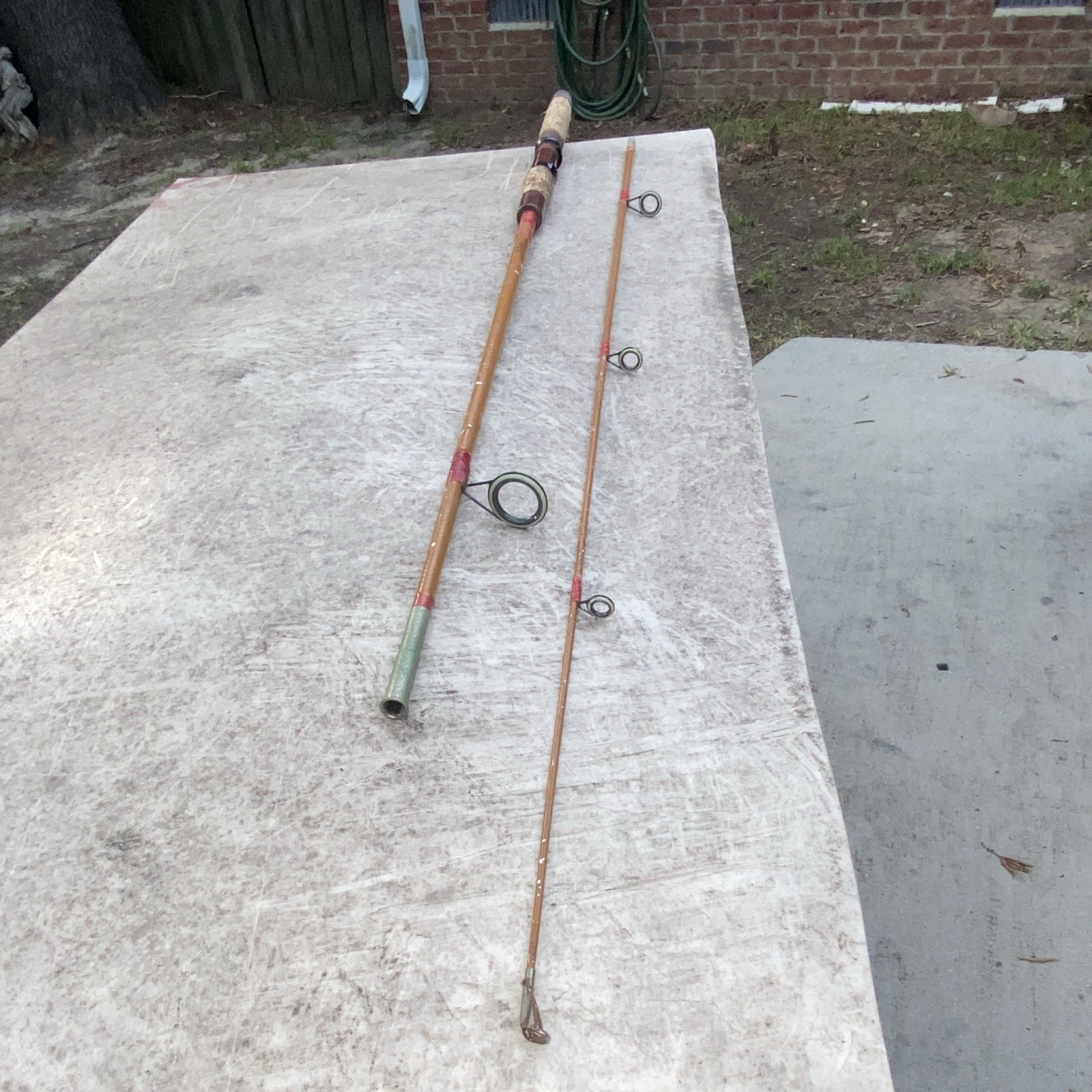 Herters103-He 6’7” Spinning Rod Fiberglass 2pc Cork Handle Brown/Red