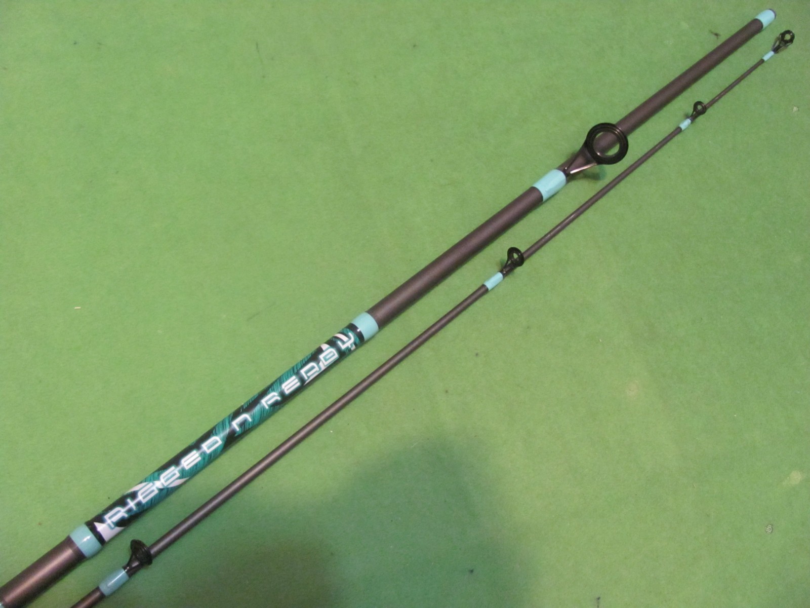 Tsunami RIGGED N READY 7′ 0″ Medium Action 2-Piece Spinning Rod.