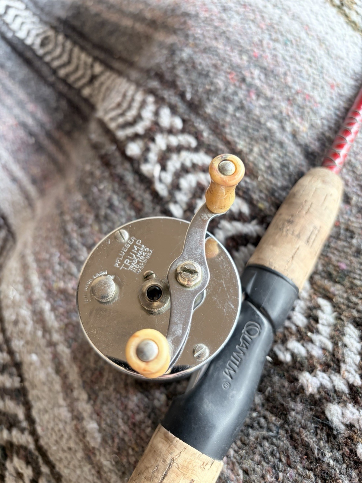 Trump Reel And kwik Stix Fishing Rod. Great Condition Ready To Cast Red Rod