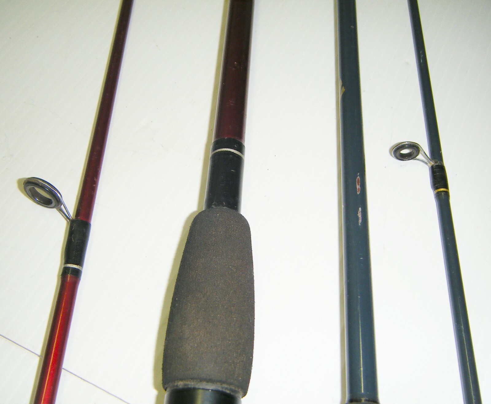 2 Shakespeare 2-Piece Spinning Rods- 1 Firebird 6’6” Med. – 1 Pro-Am 5’6” Light