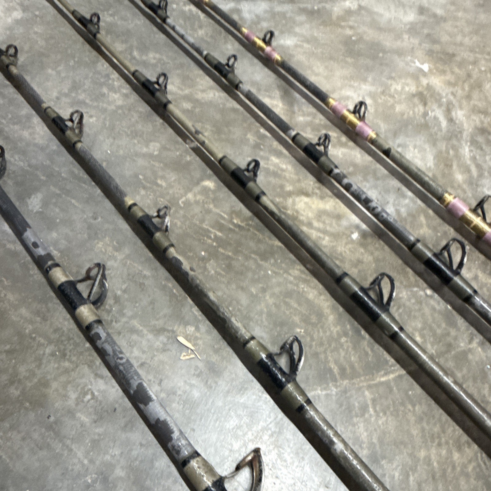 5- Custom tuna rods- used- Calstar blanks- Winthrop tips except 1 of them.
