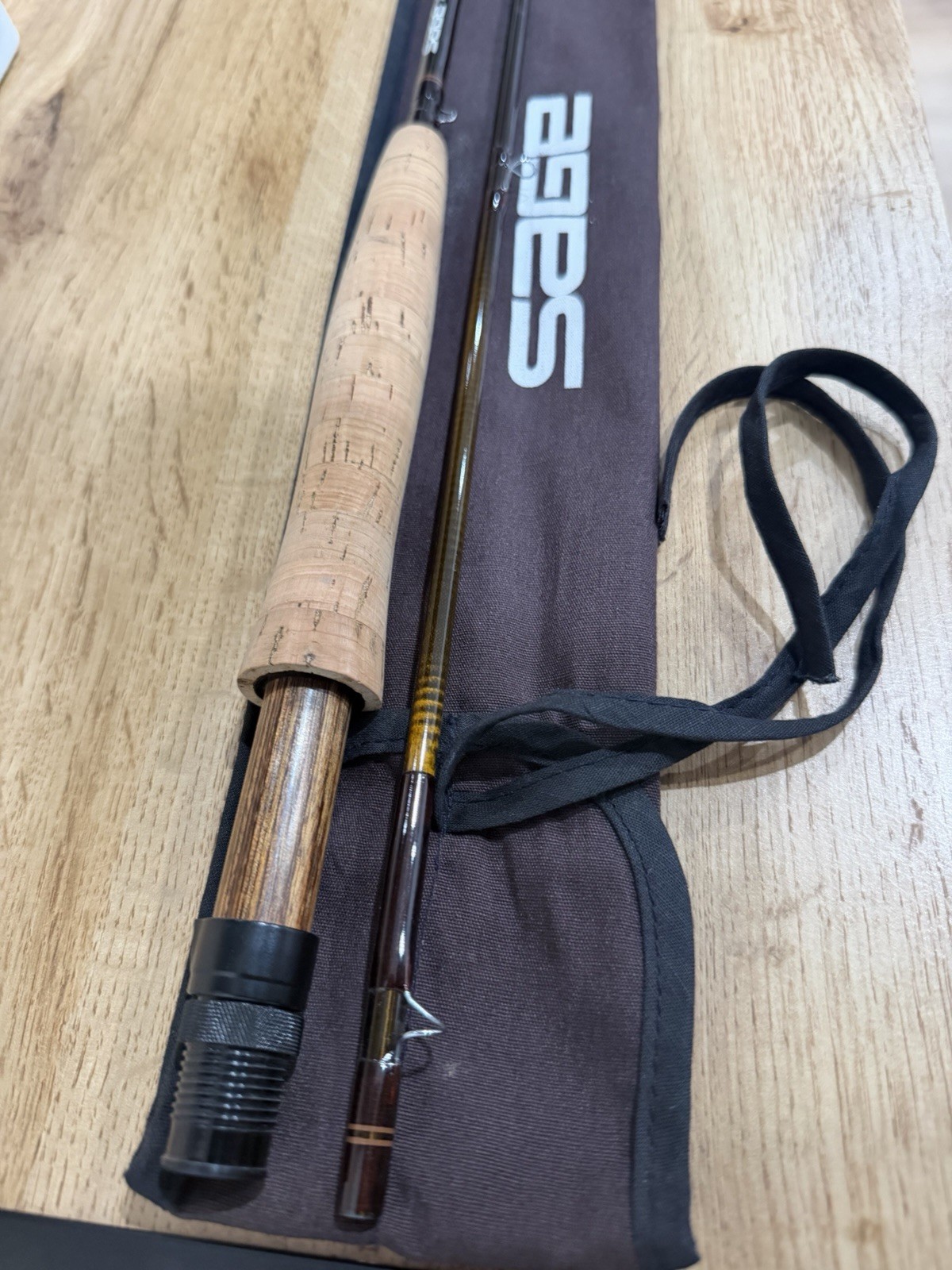 features a Sage Graphite III 690 RPL fly fishing rod NO TUBE