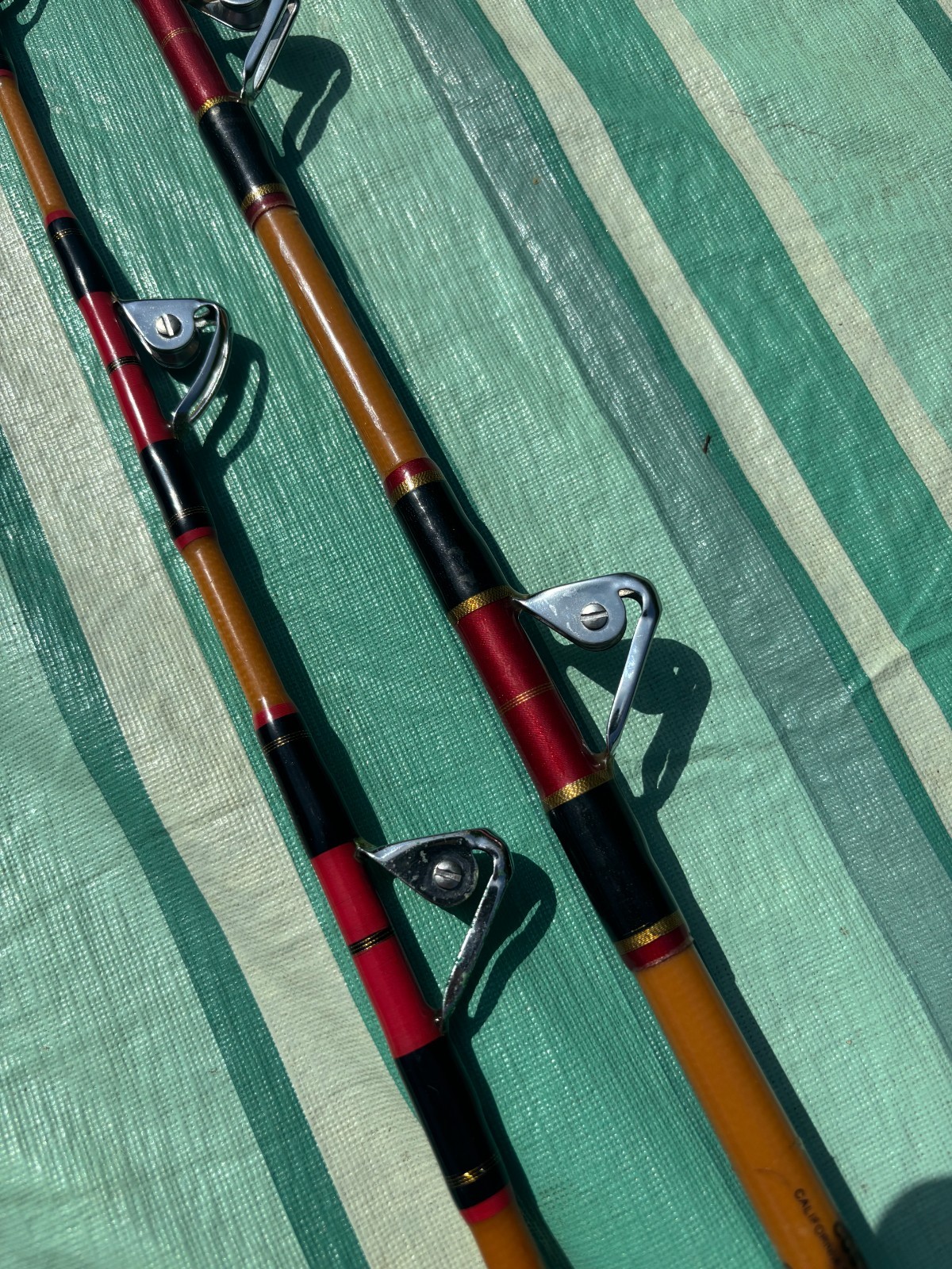 LOT of 2 VINTAGE HEAVY SABRE STROKER ROLLER TROLLING FISHING RODS VERY NICE!!