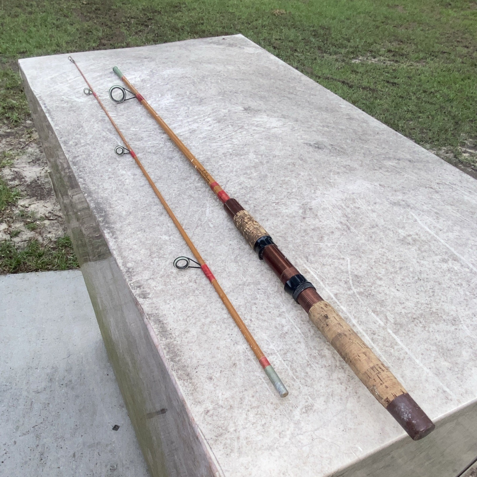 Herters103-He 6’7” Spinning Rod Fiberglass 2pc Cork Handle Brown/Red