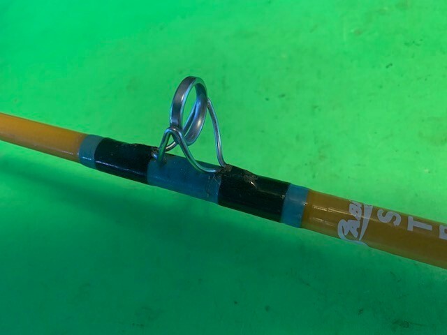 VINTAGE GOLDEN SABRE STROKER 6 FOOT 6 INCH 20 TO 50 POUND RATED FISHING ROD
