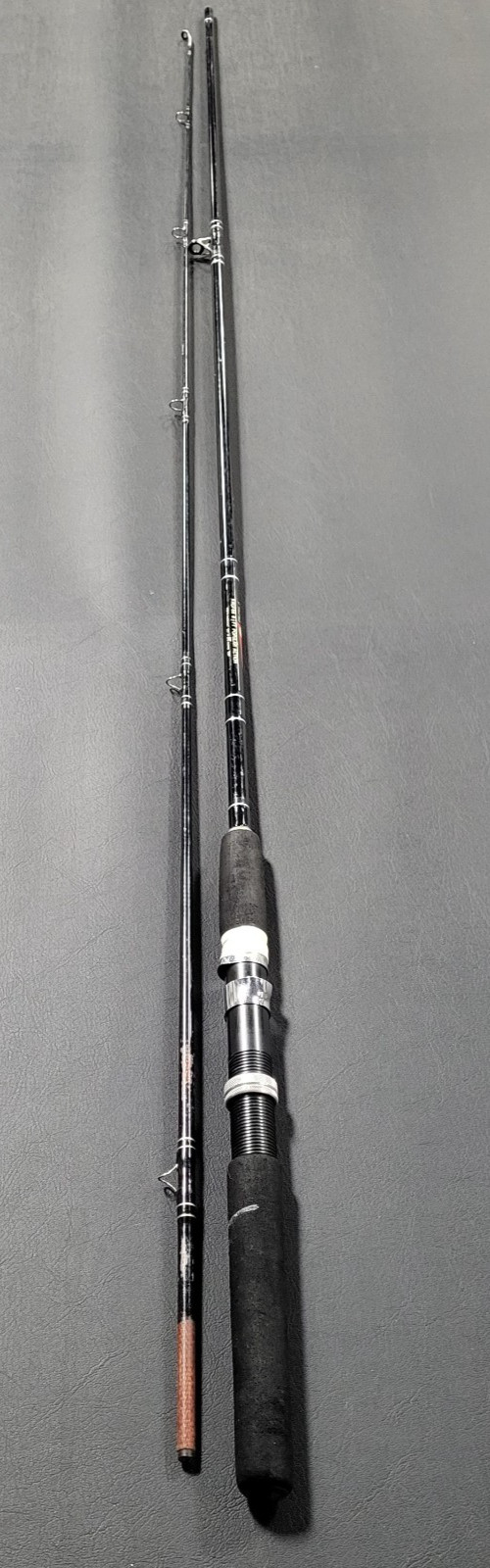 Abu Garcia Popular Action RRGF86, 8’6″ Medium Graphite Spinning Rod 2-Pc, VG+