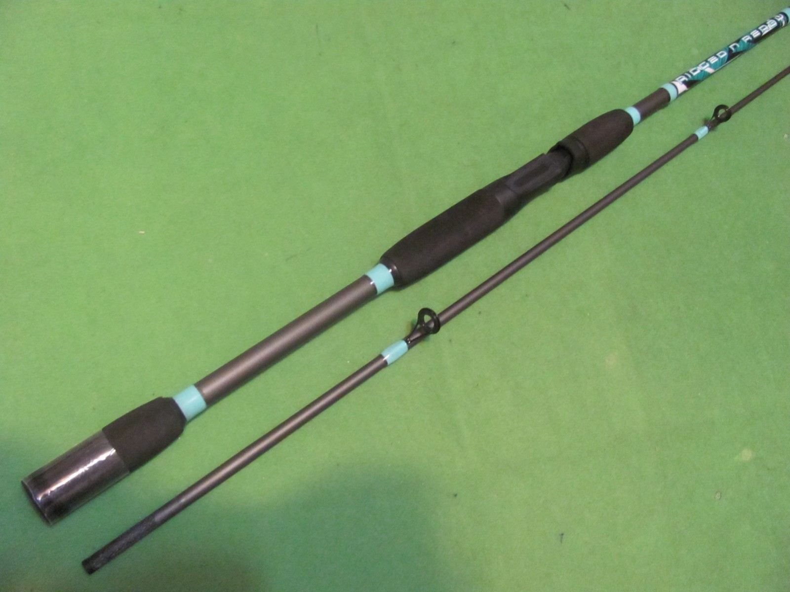 Tsunami RIGGED N READY 7′ 0″ Medium Action 2-Piece Spinning Rod.