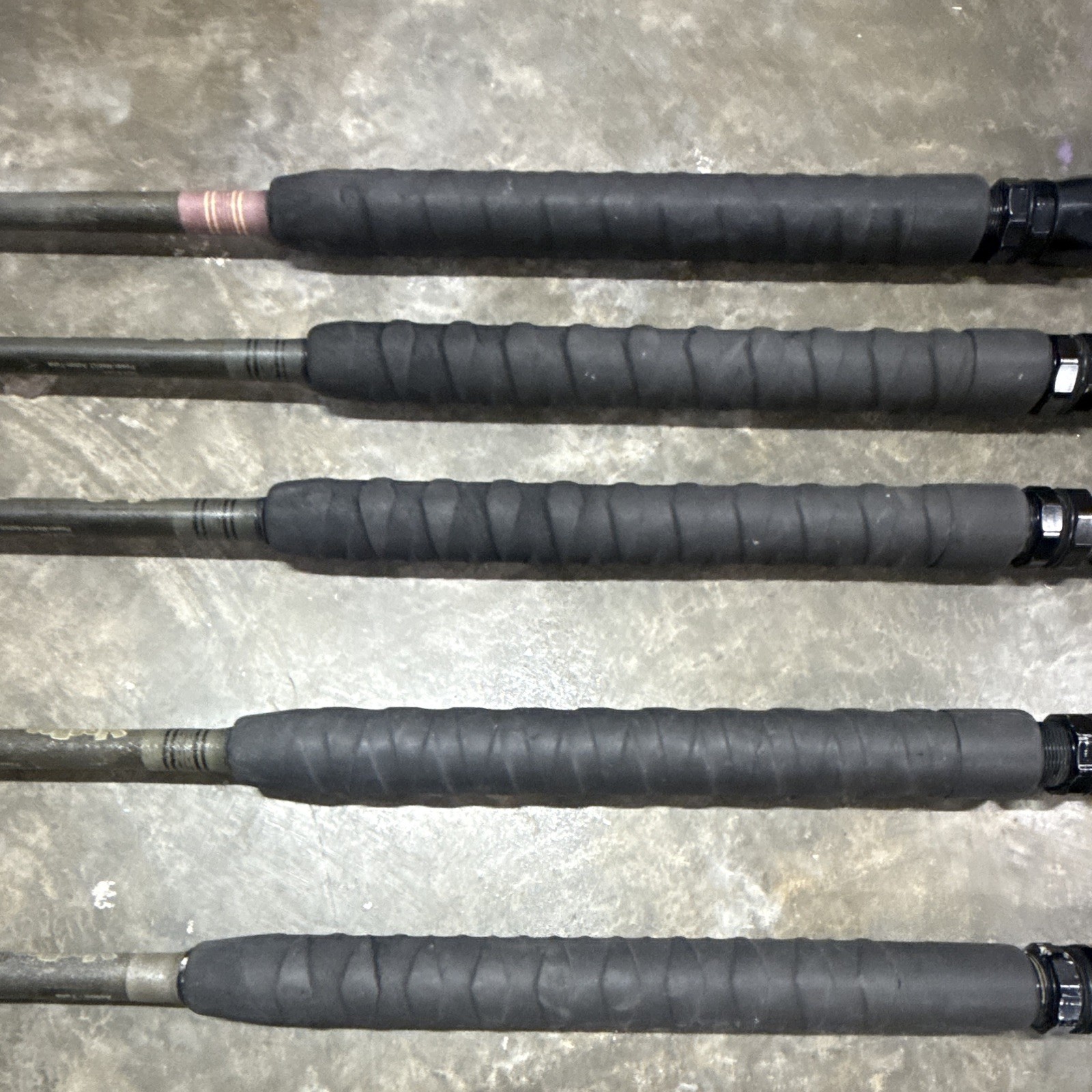 5- Custom tuna rods- used- Calstar blanks- Winthrop tips except 1 of them.