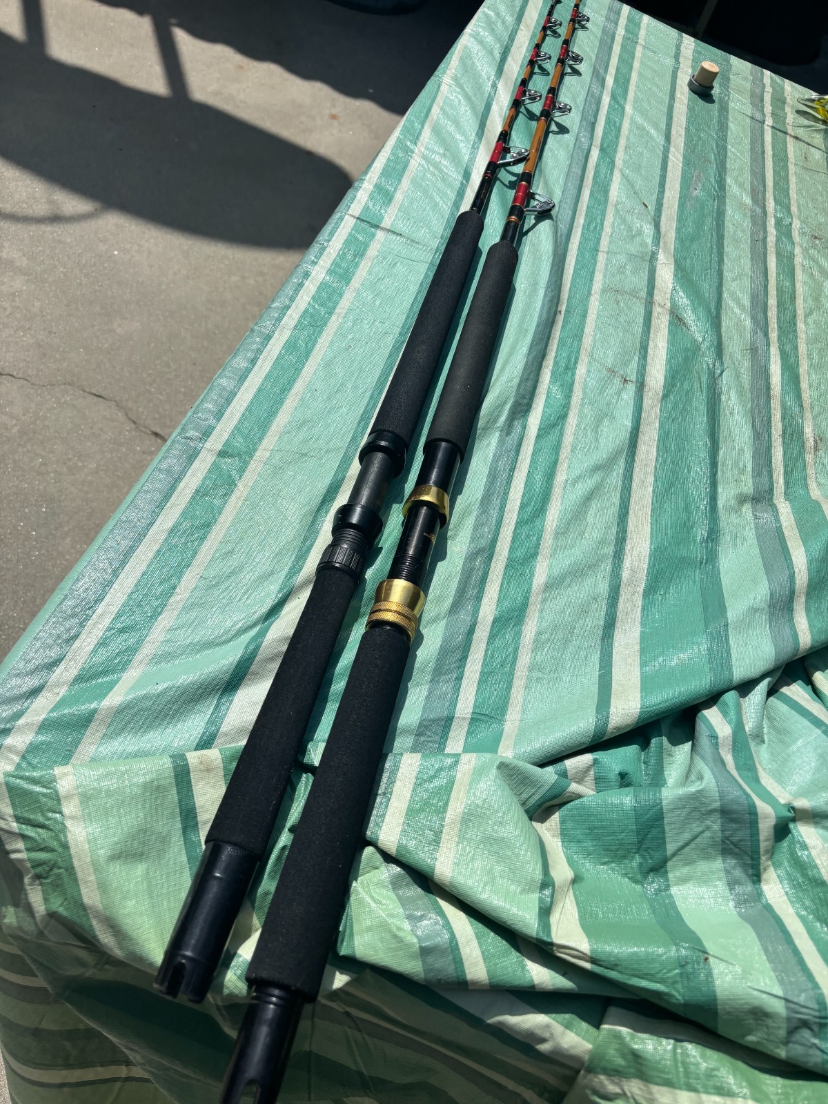 LOT of 2 VINTAGE HEAVY SABRE STROKER ROLLER TROLLING FISHING RODS VERY NICE!!