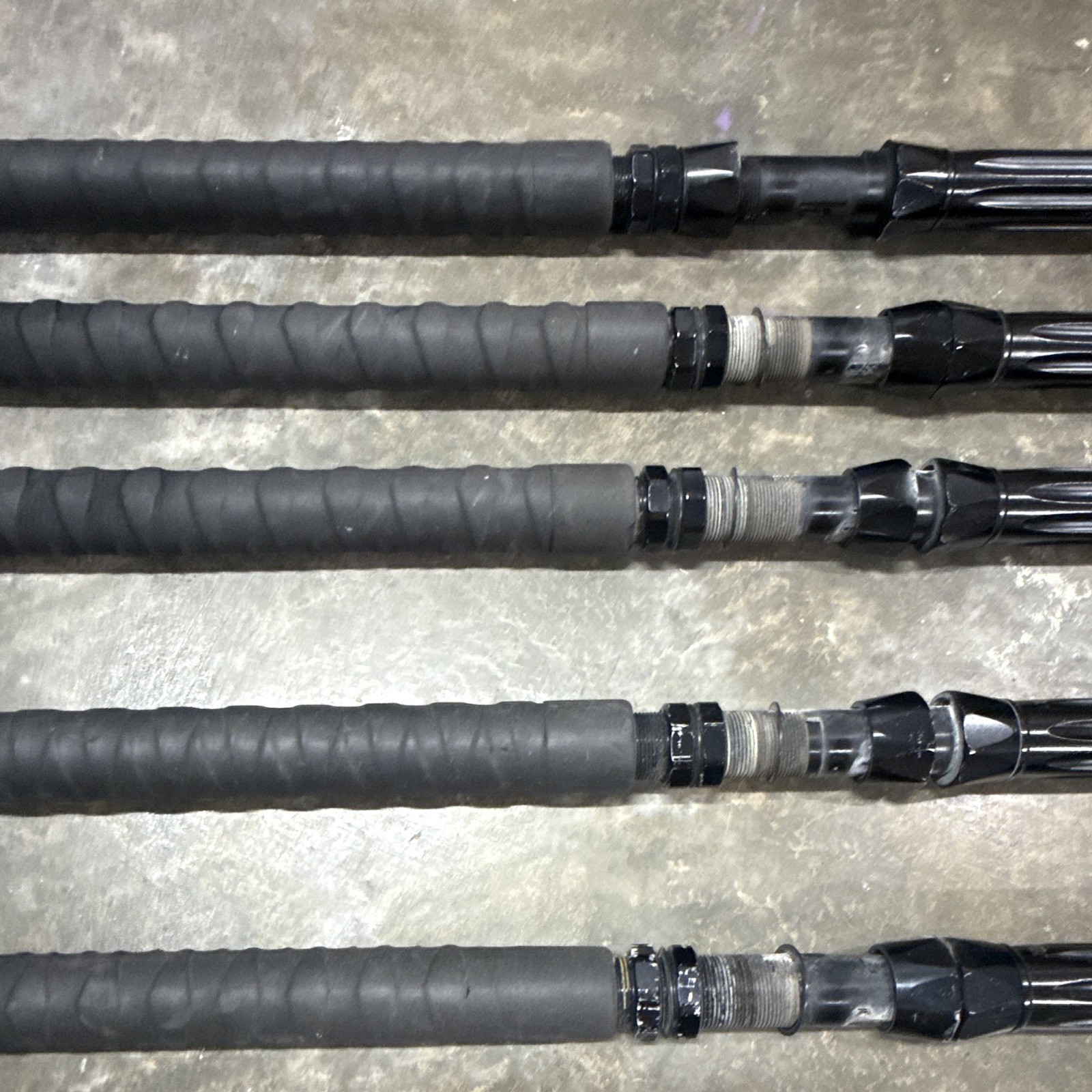 5- Custom tuna rods- used- Calstar blanks- Winthrop tips except 1 of them.
