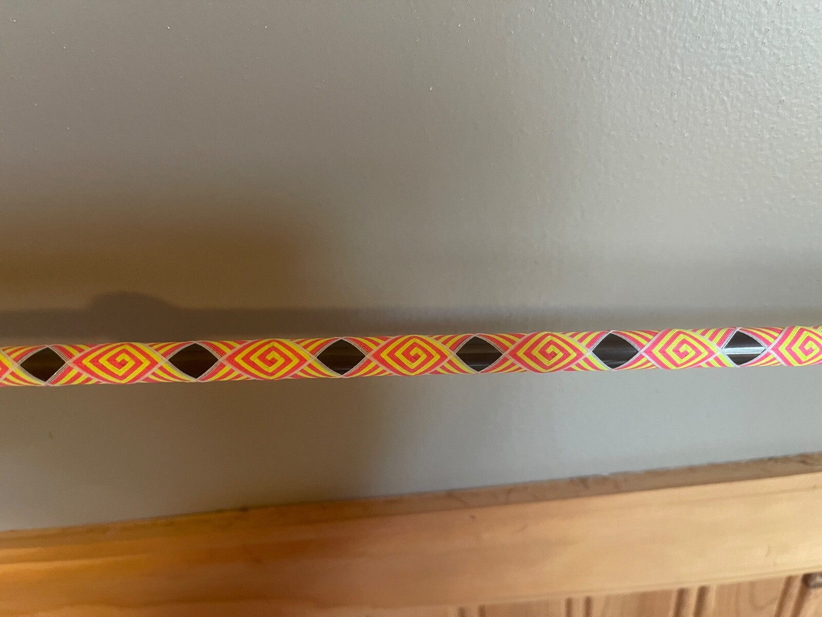 Custom hand made Fishing rod wraps. Made with thread and epoxy.