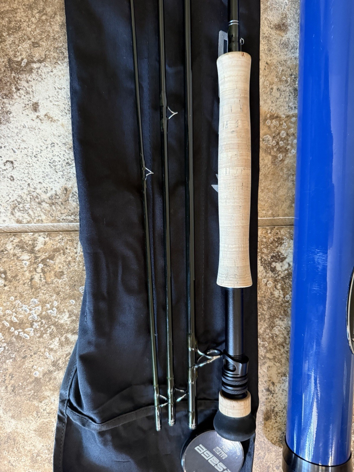 Sage X 890-4 Fly Rod 8 wt 9ft 4pc with a sage salt tube and sock