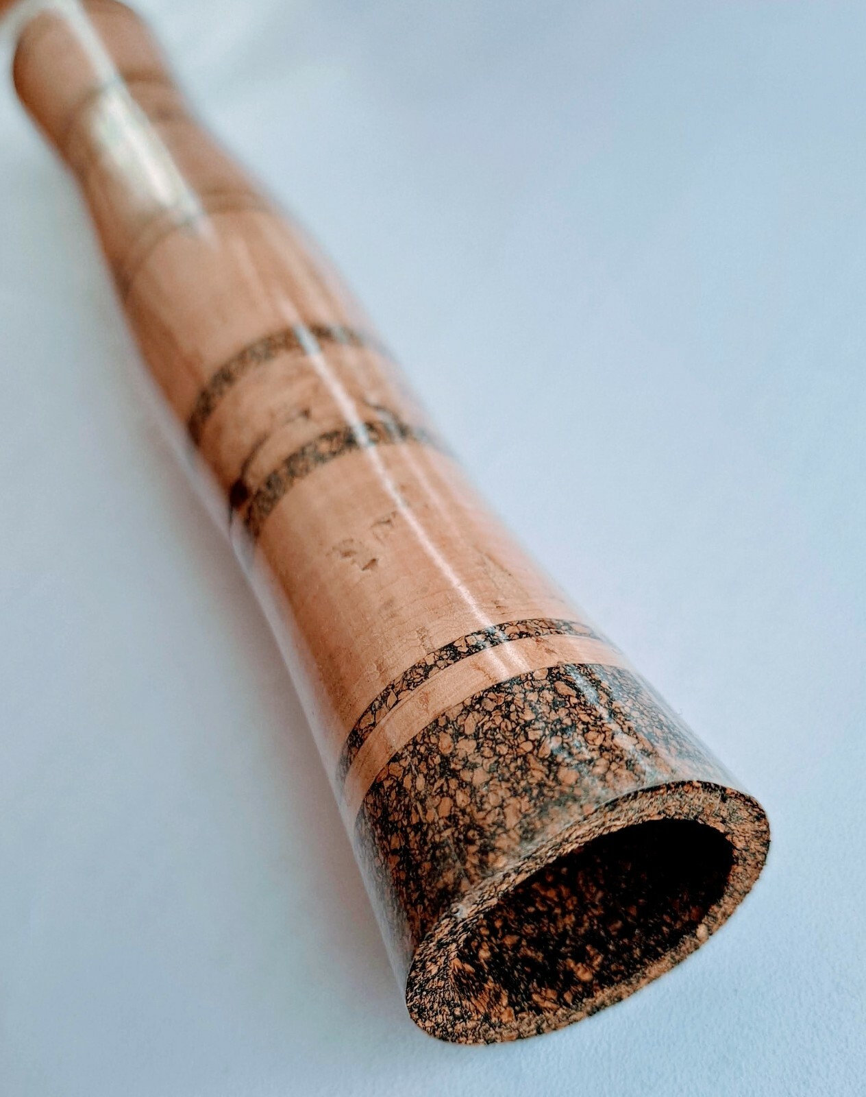 Fly rod full wells grip with composite burl