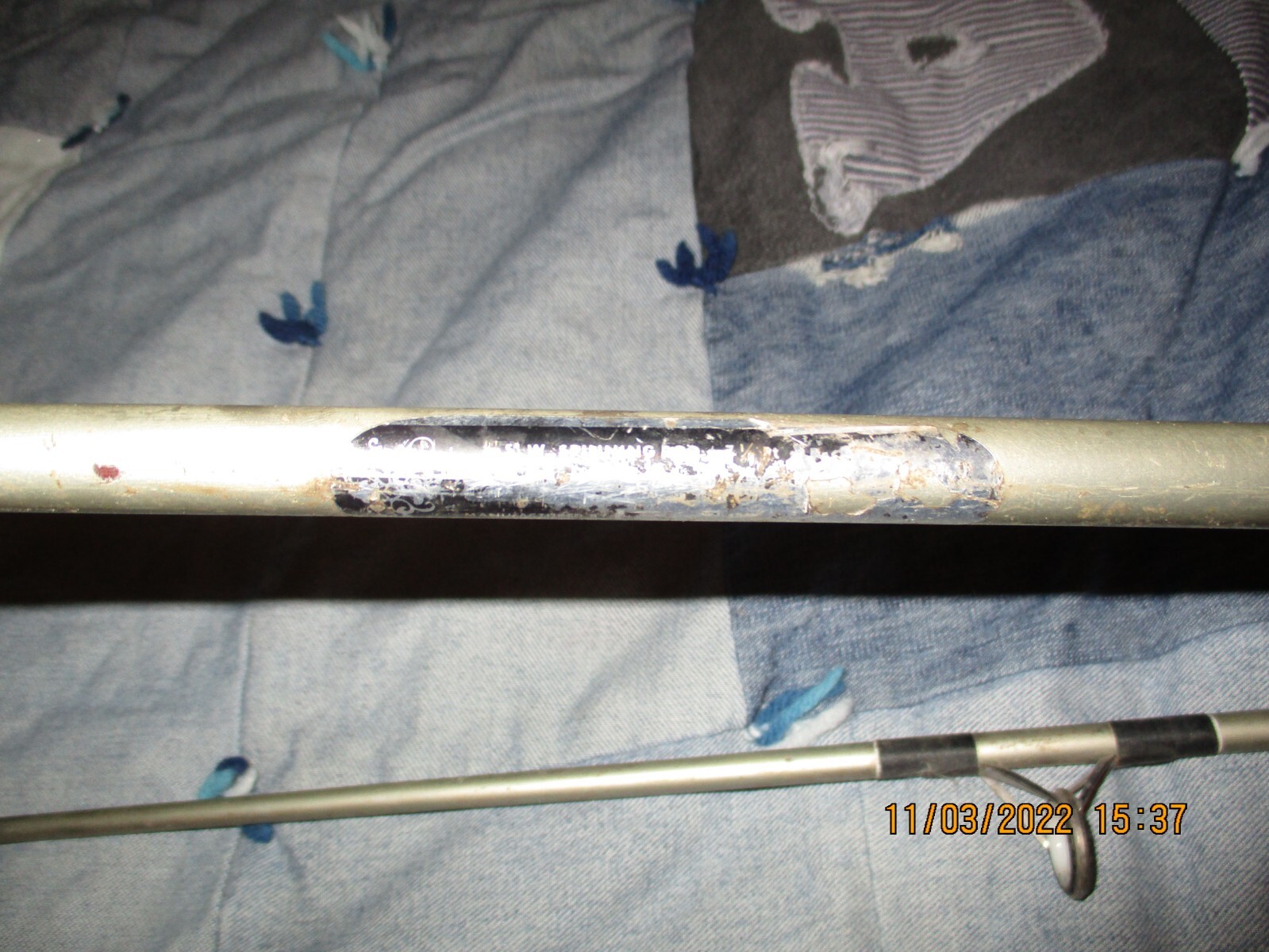 S.W. SPINNING ROD , 7 FOOT LENGTH – WELL USED , BUT STILL USEABLE!