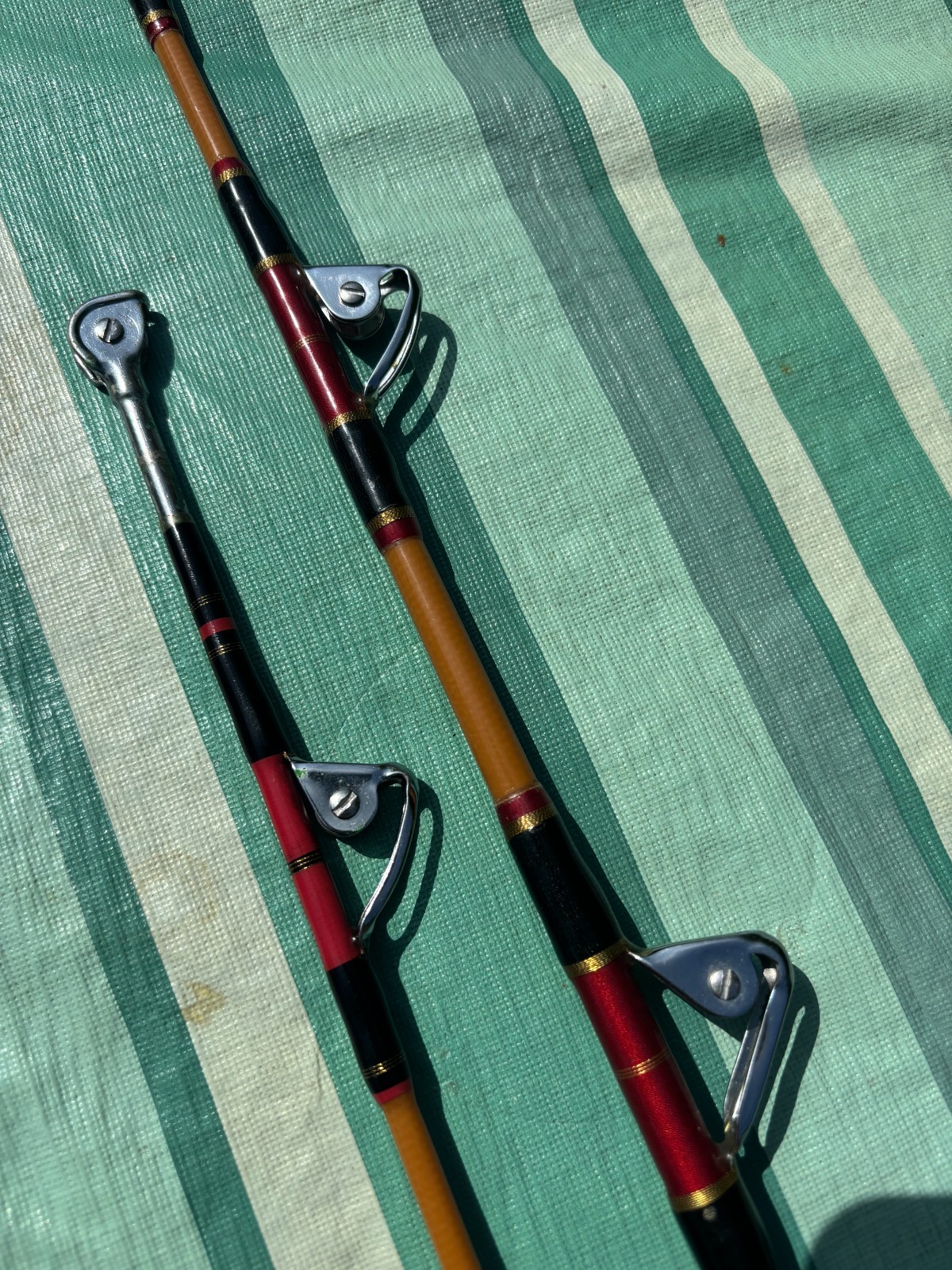 LOT of 2 VINTAGE HEAVY SABRE STROKER ROLLER TROLLING FISHING RODS VERY NICE!!
